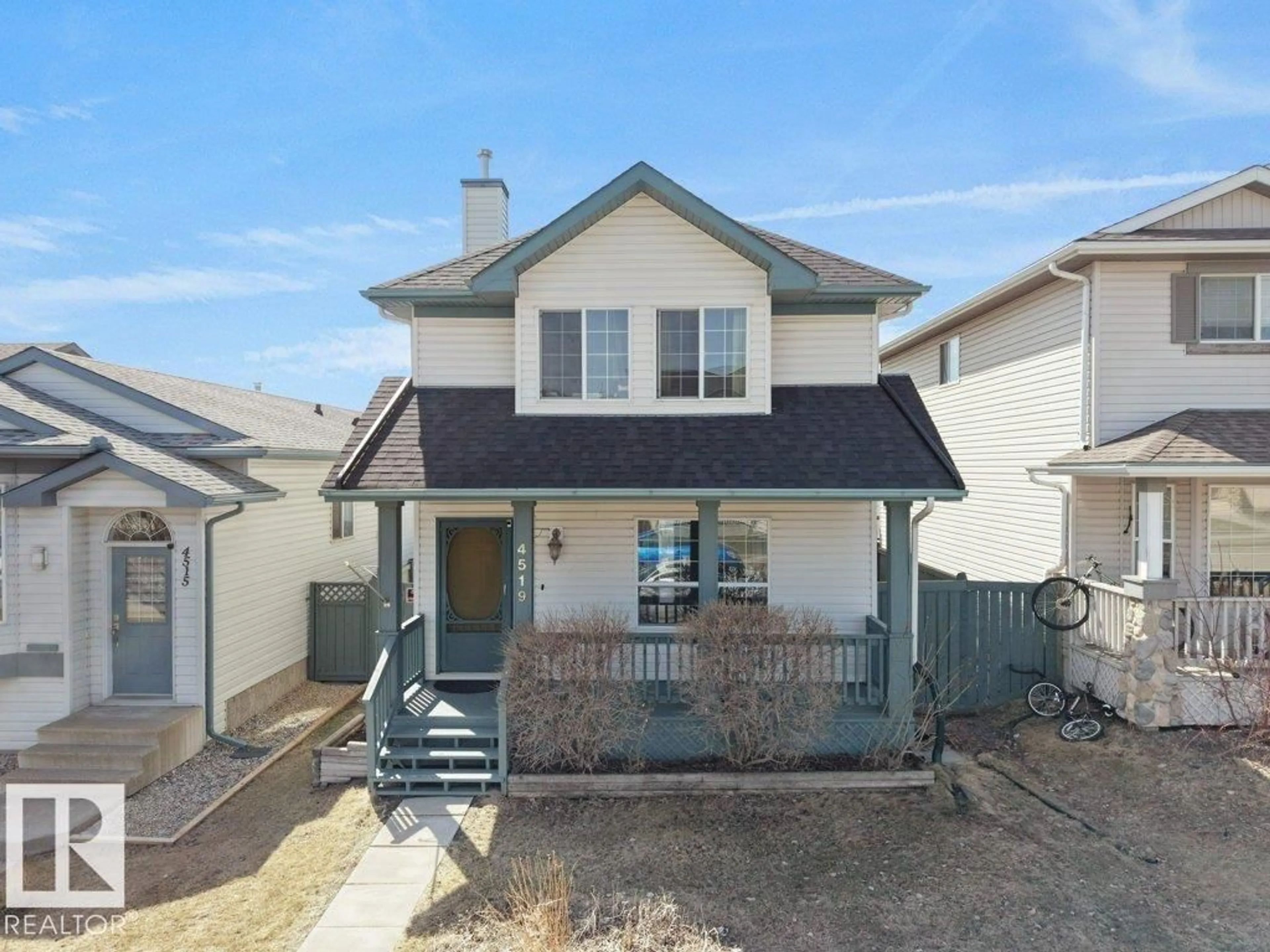 Home with vinyl exterior material, street for NW - 4519 149 AV, Edmonton Alberta T5Y2Y9