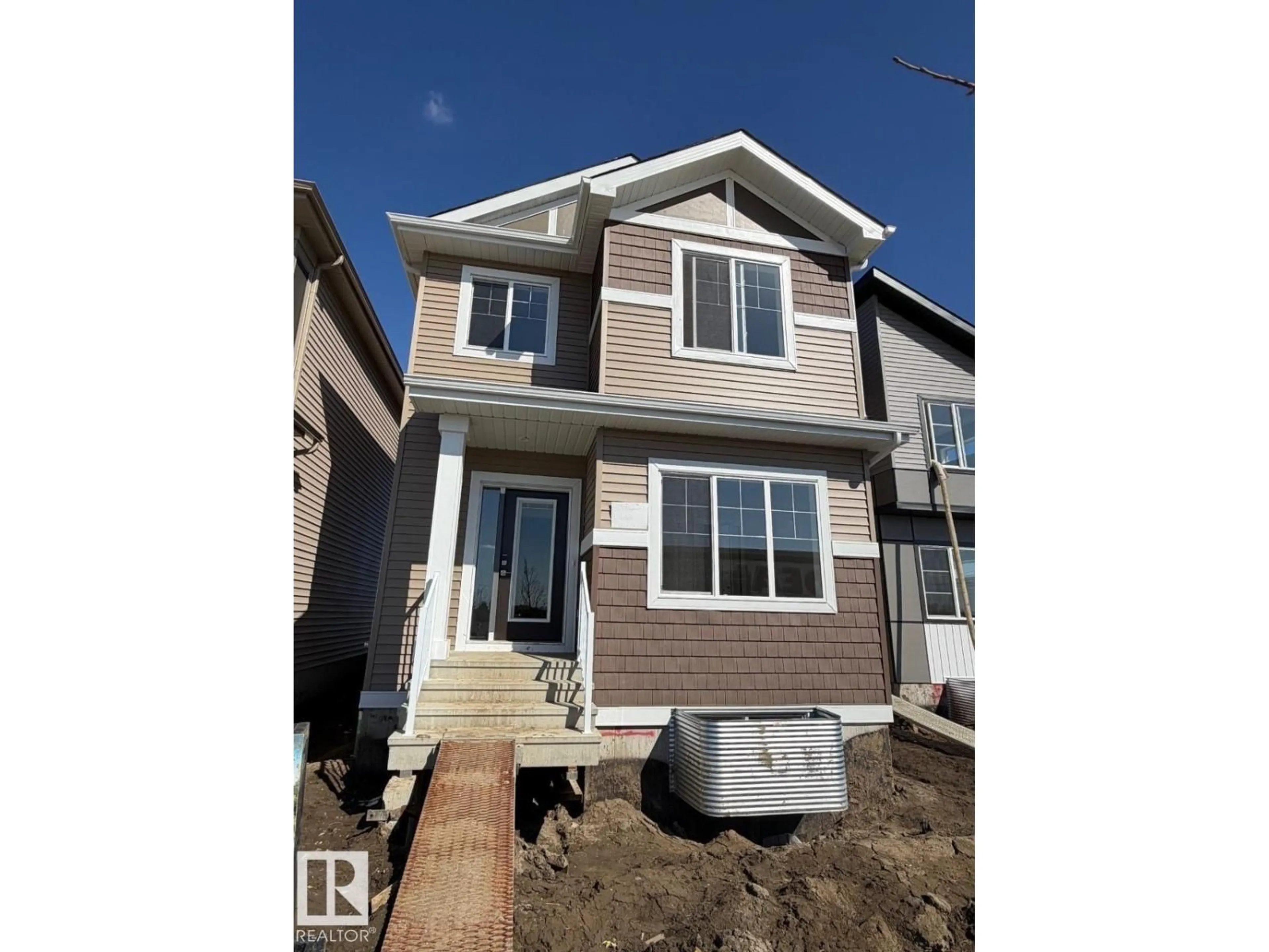 Home with vinyl exterior material, street for 305 EDGEMONT DR, Edmonton Alberta T6M3G7