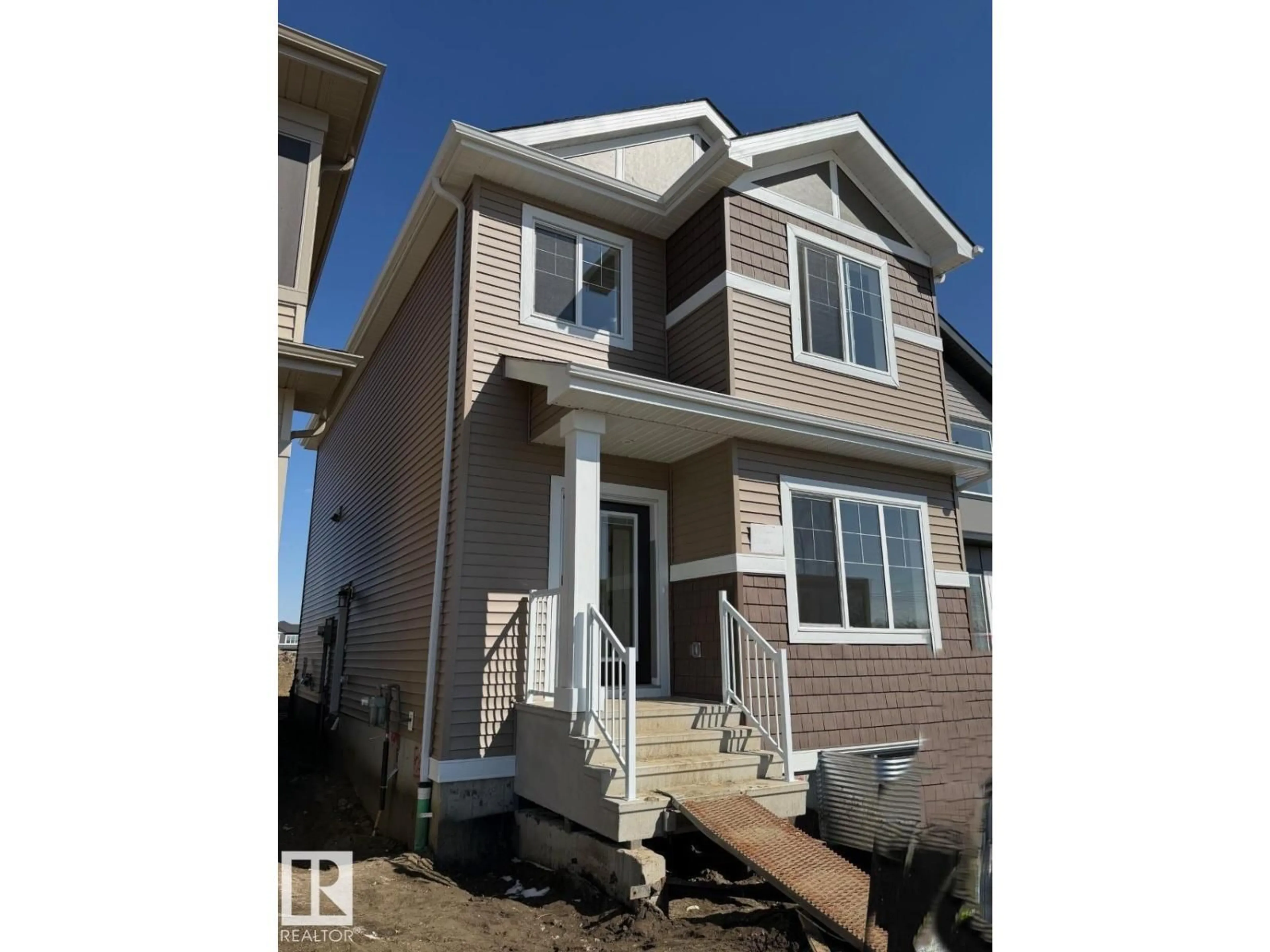 Home with vinyl exterior material, street for 305 EDGEMONT DR, Edmonton Alberta T6M3G7