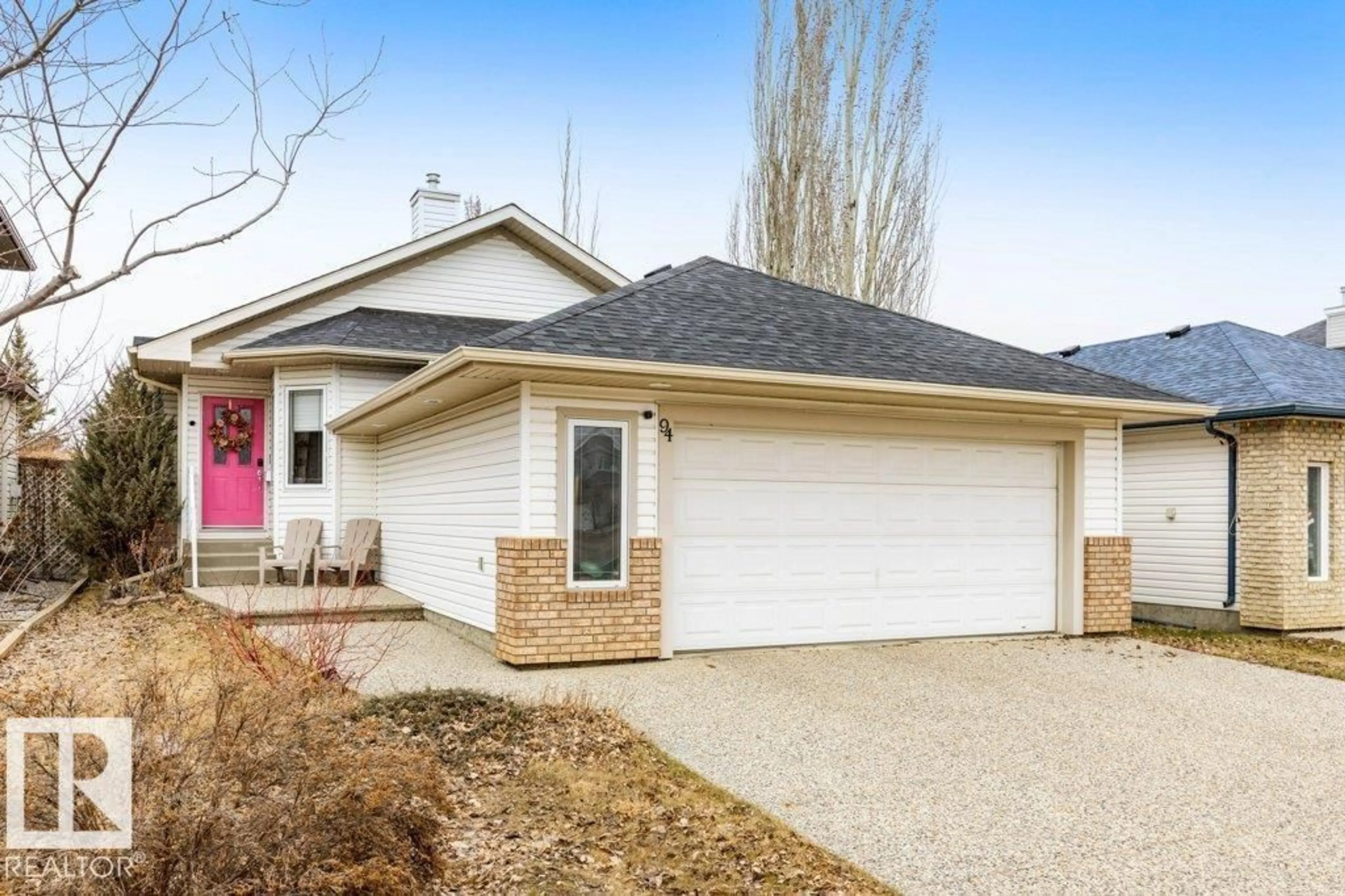 Home with vinyl exterior material, street for 94 EASTGATE WY, St. Albert Alberta T8N7K1