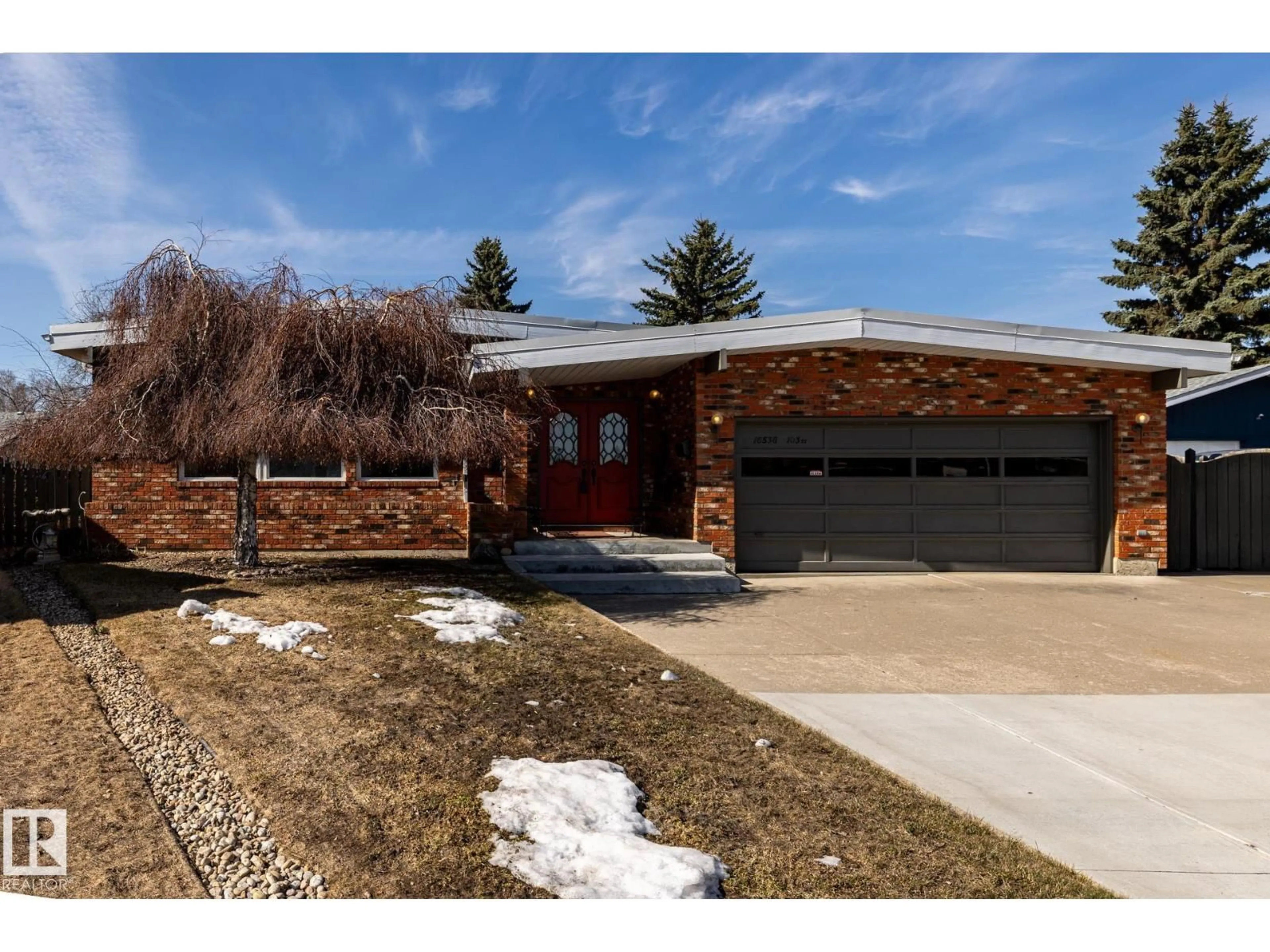 Home with brick exterior material, street for 16536 103 ST, Edmonton Alberta T5X2H4