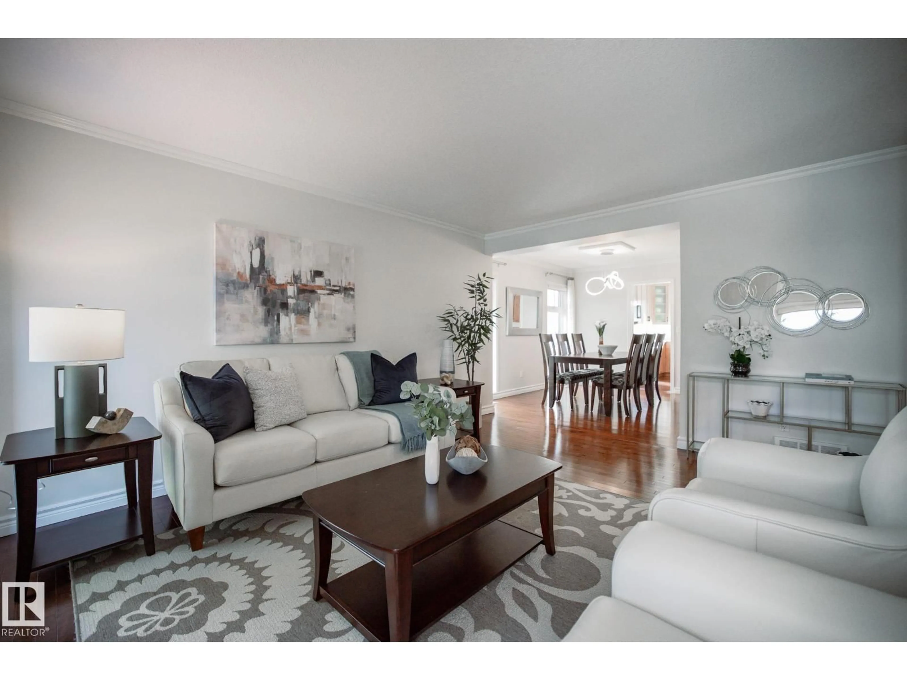 Living room with furniture, wood/laminate floor for 15155 RAMSAY CR, Edmonton Alberta T6H5R1