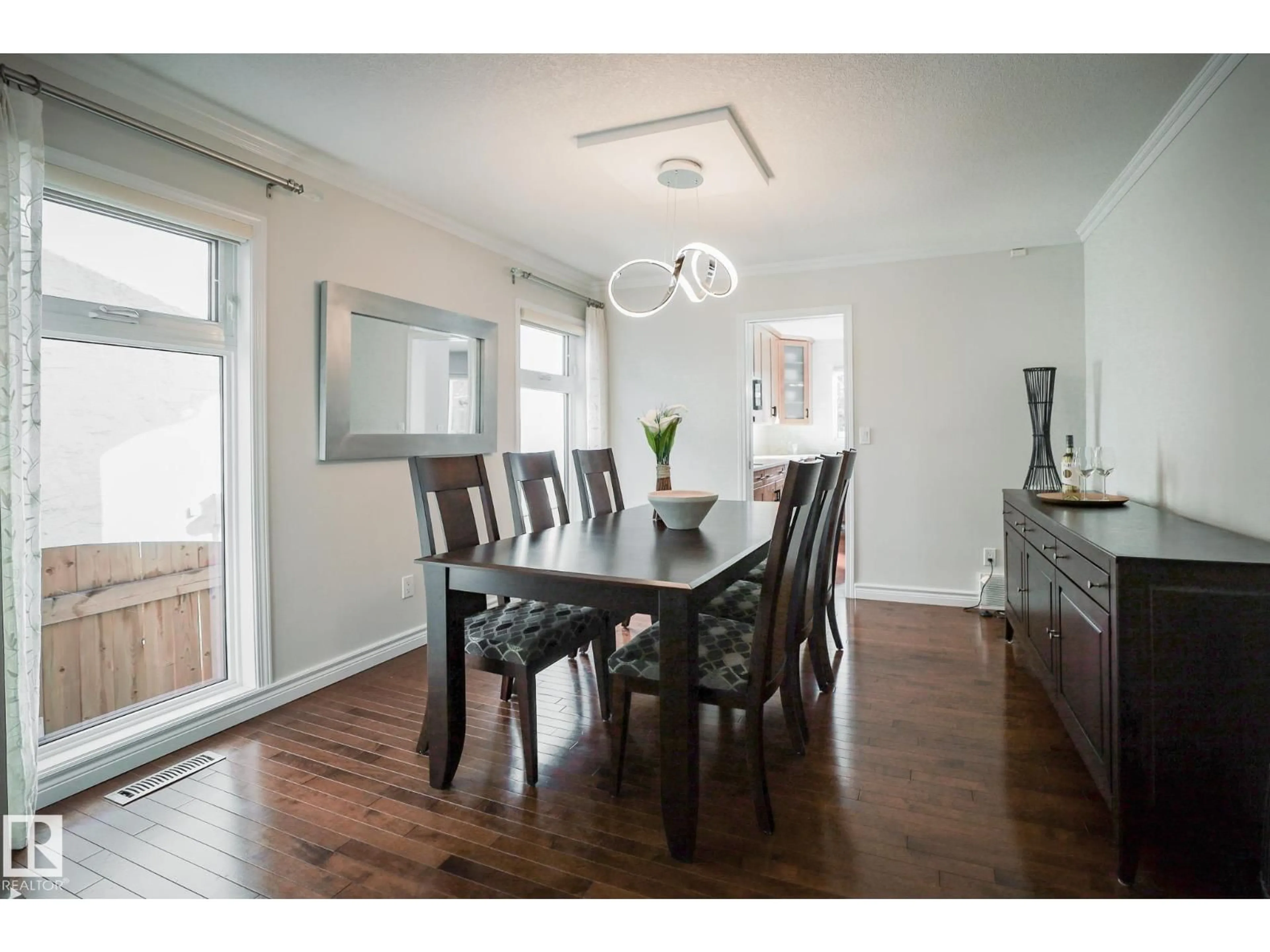 Dining room, wood/laminate floor for 15155 RAMSAY CR, Edmonton Alberta T6H5R1