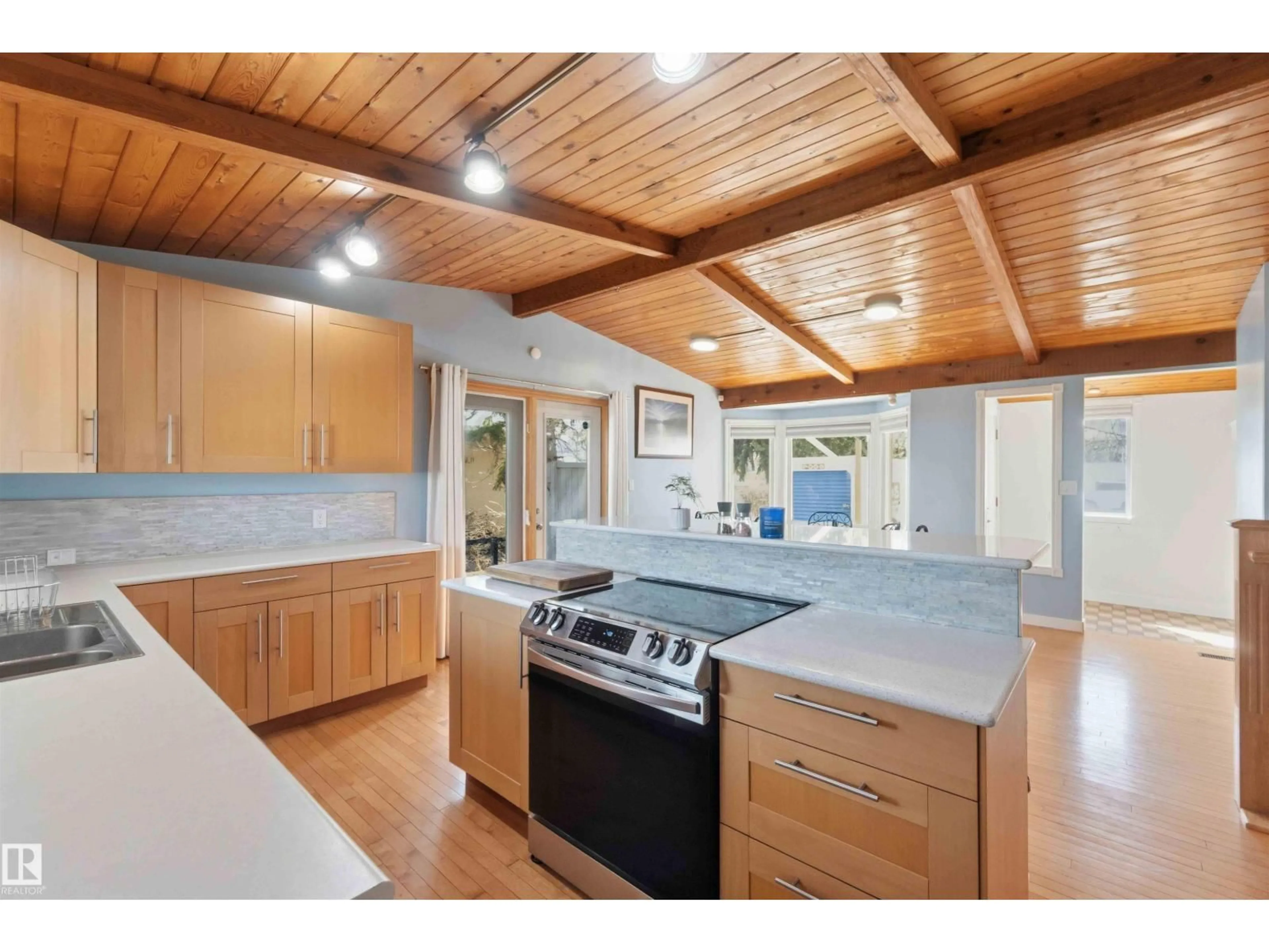 Open concept kitchen, wood/laminate floor for NW - 10331 151 ST, Edmonton Alberta T5P1T9