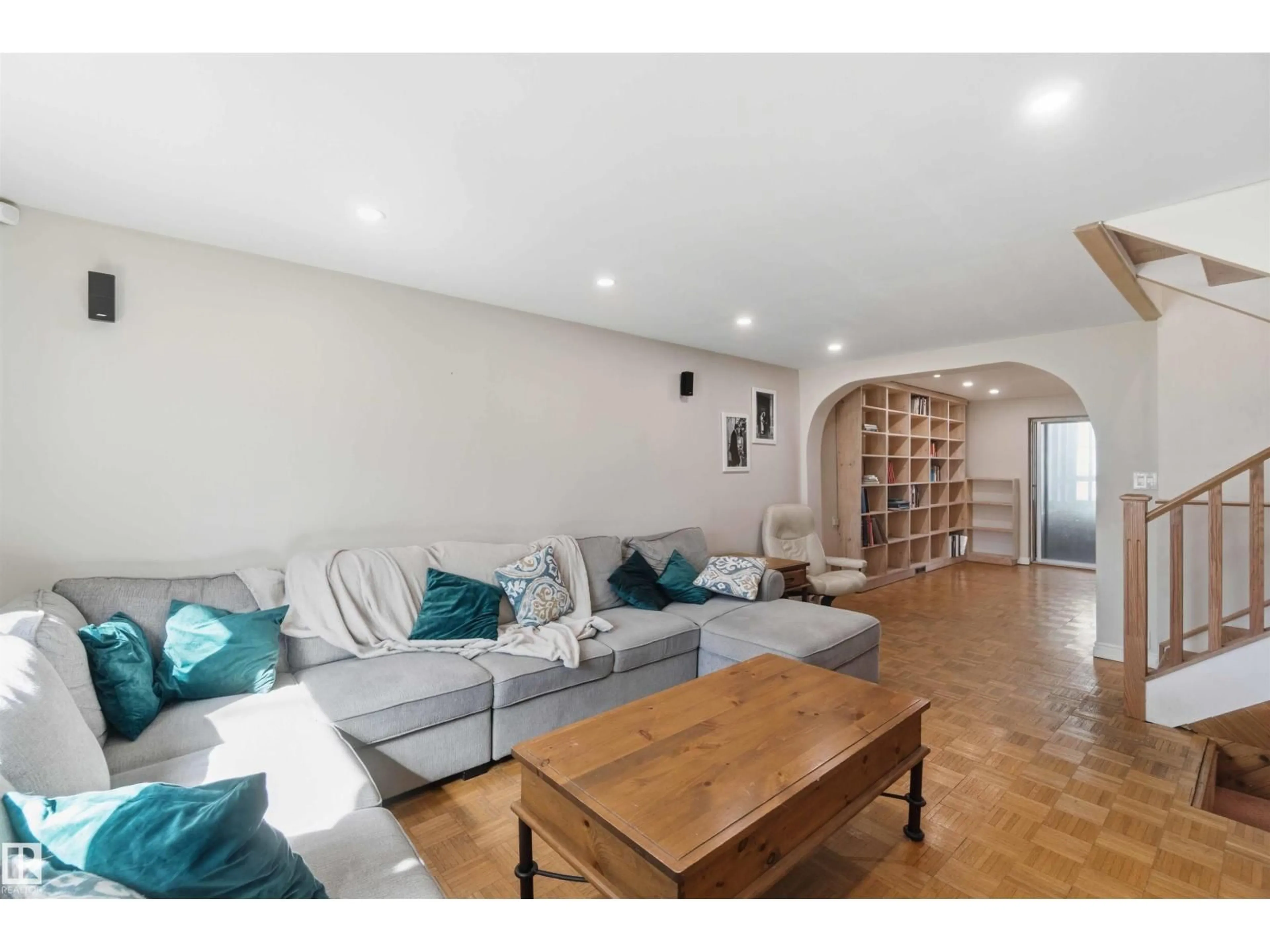 Living room with furniture, wood/laminate floor for NW - 10331 151 ST, Edmonton Alberta T5P1T9