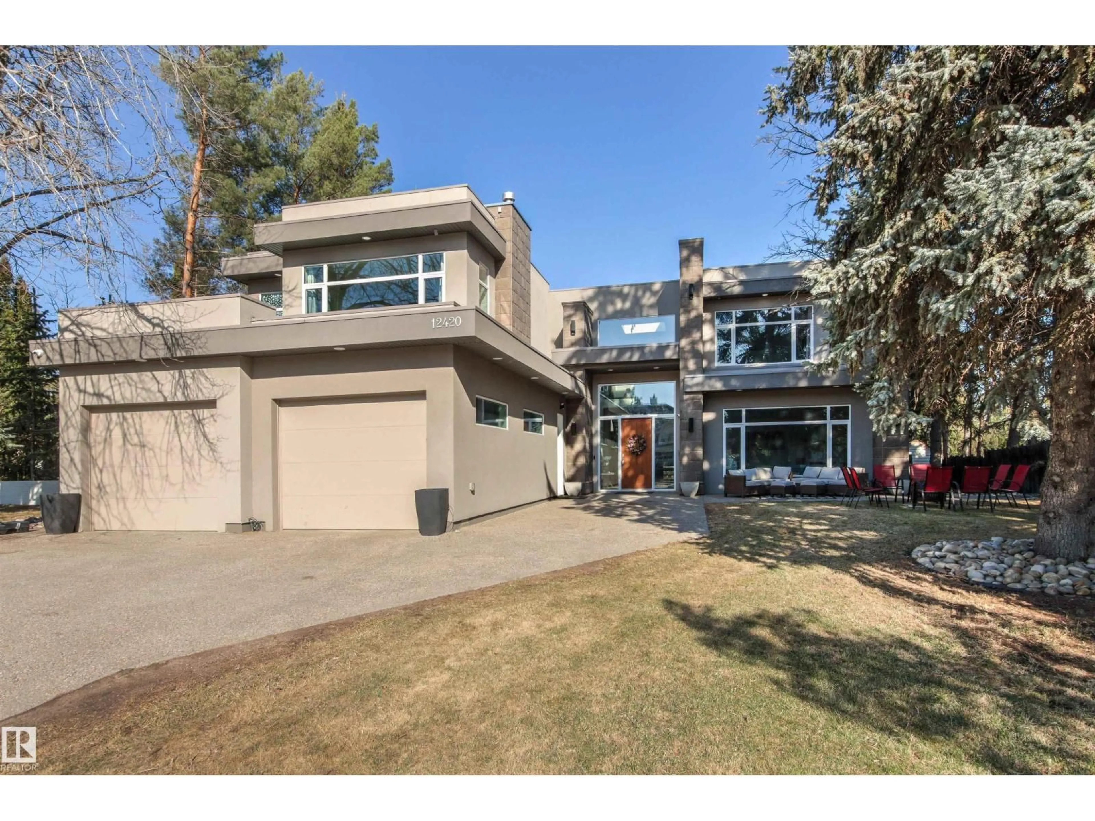 Home with vinyl exterior material, street for 12420 GRAND VIEW DR, Edmonton Alberta T6H4K4