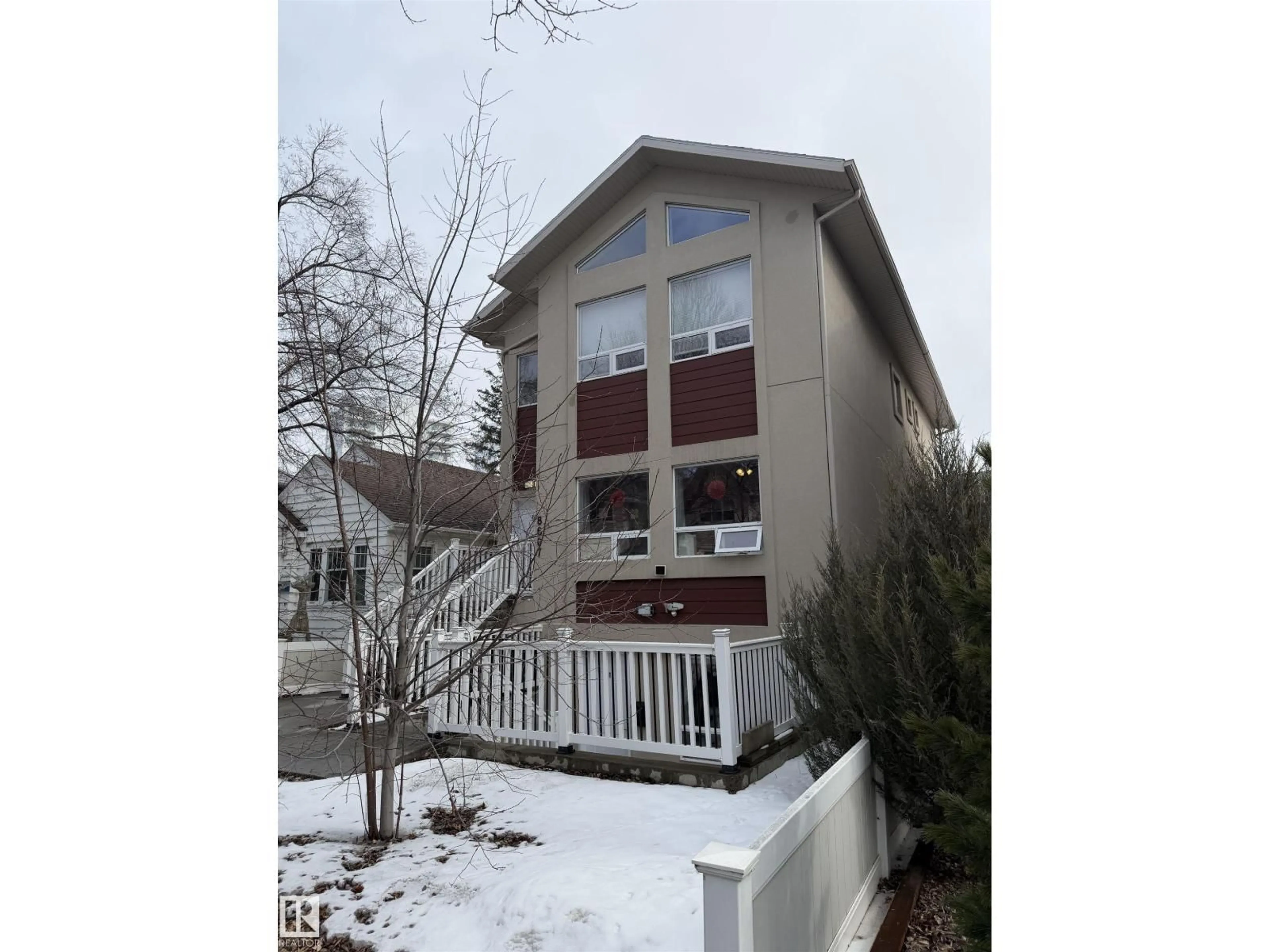 Home with vinyl exterior material, mountain view for 8607 108A ST NW, Edmonton Alberta T6E4M9