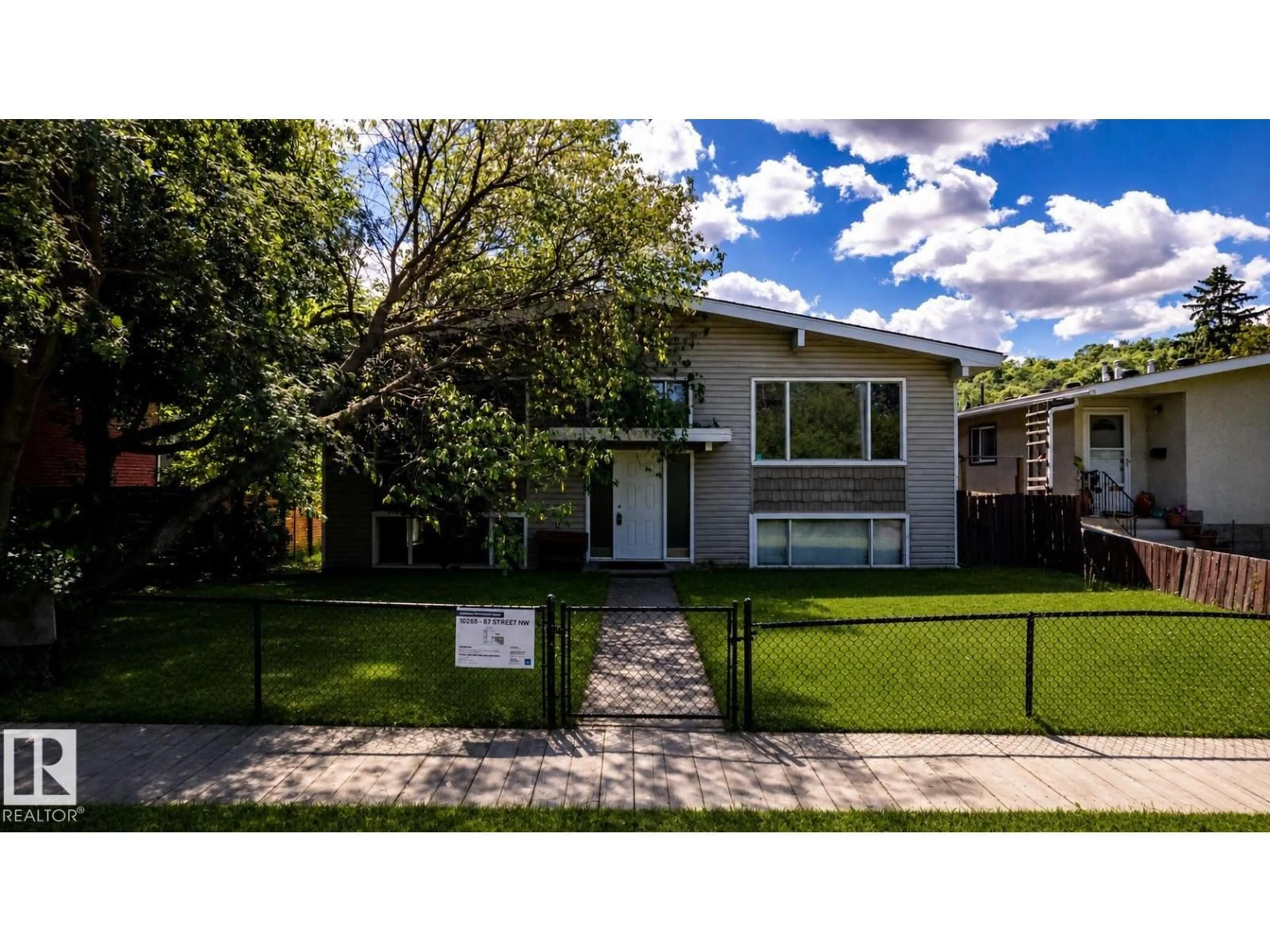 Home with vinyl exterior material, street for NW - 10268 87 ST, Edmonton Alberta T5H1N6