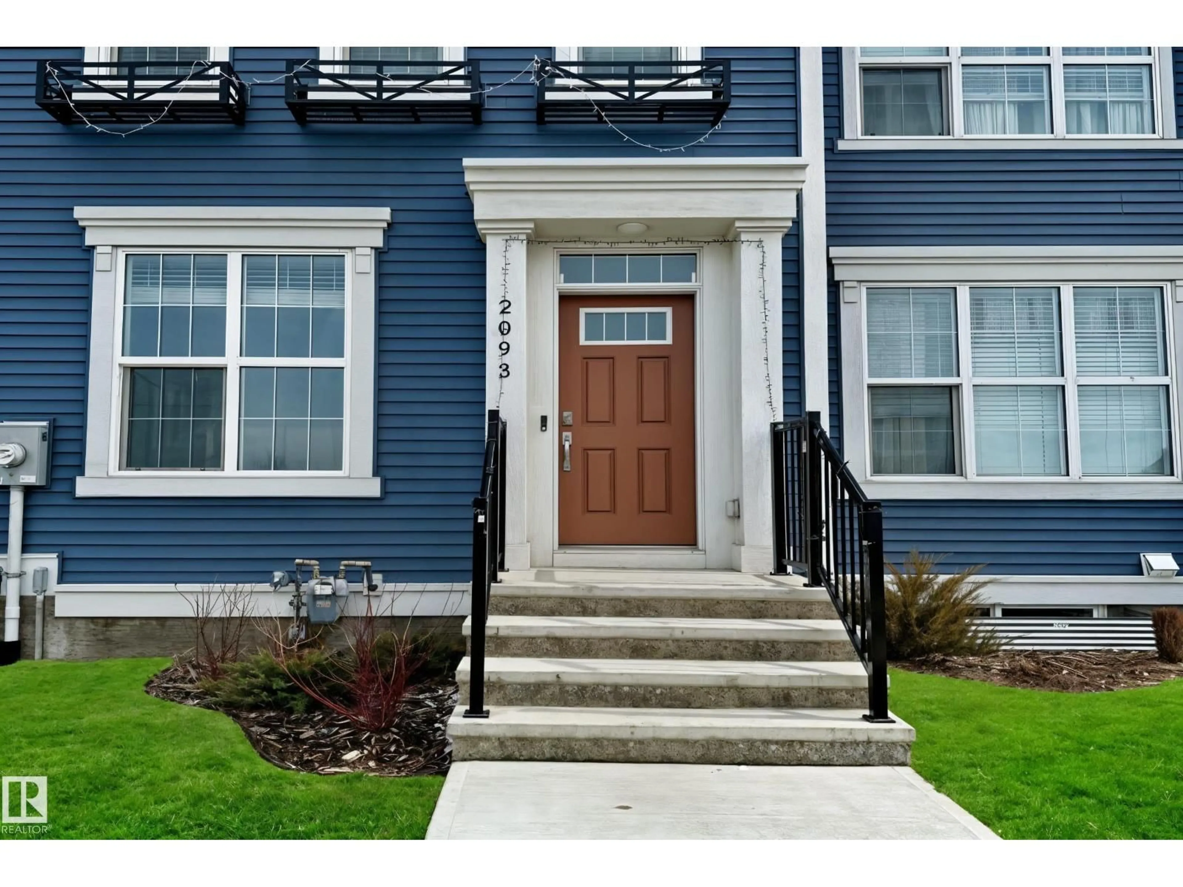 Home with vinyl exterior material, street for 2093 MAPLE RD, Edmonton Alberta T6T2S8