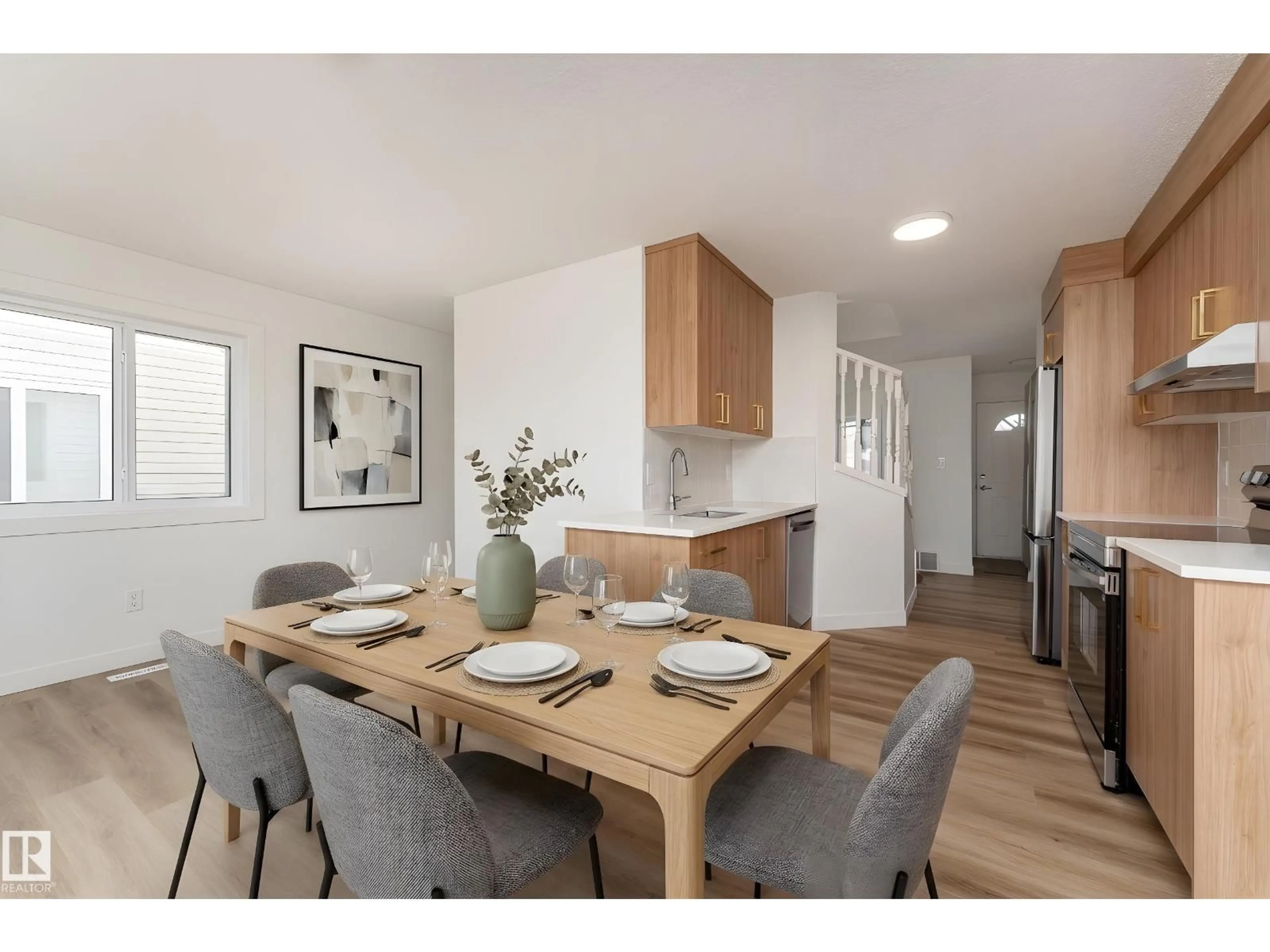 Dining room, wood/laminate floor for 1033 - 63 YOUVILLE DR, Edmonton Alberta T6L6V9