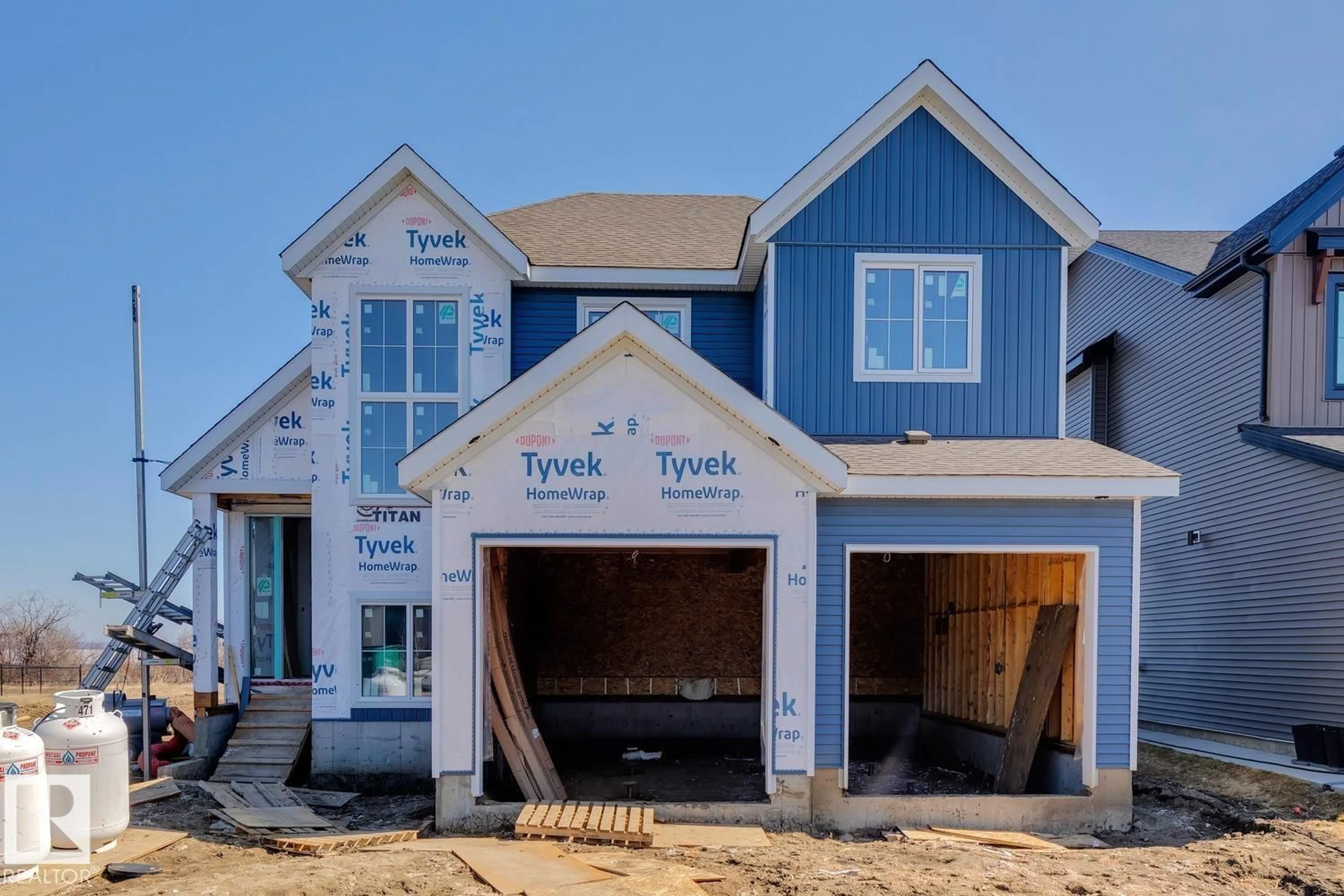 Home with vinyl exterior material, street for 31 - 3410 STE ANNE TRAIL, Rural Lac Ste. Anne County Alberta T0E0A1