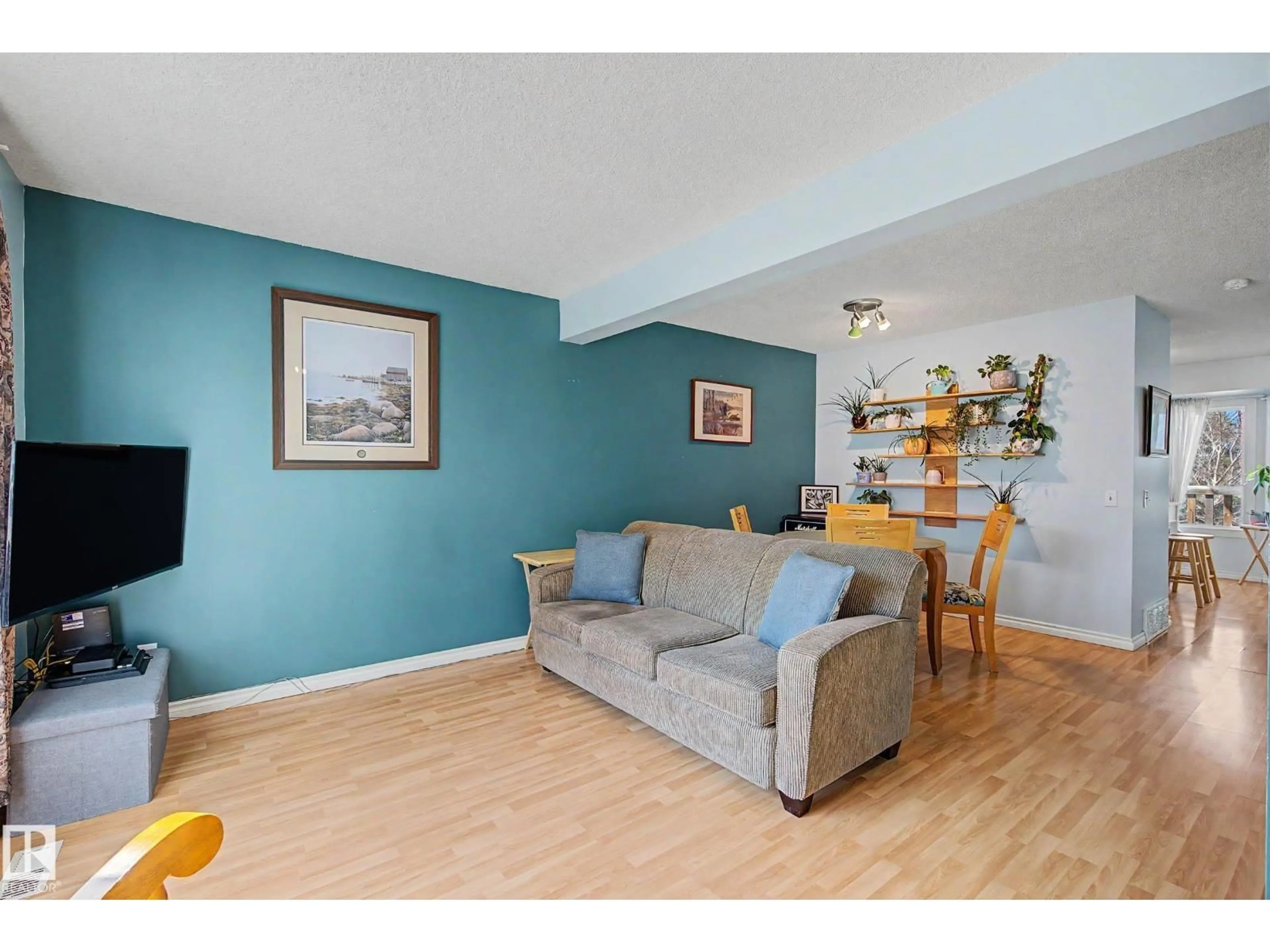 Living room with furniture, wood/laminate floor for 5 - 129 ABERDEEN WY, Stony Plain Alberta T7Z1N1