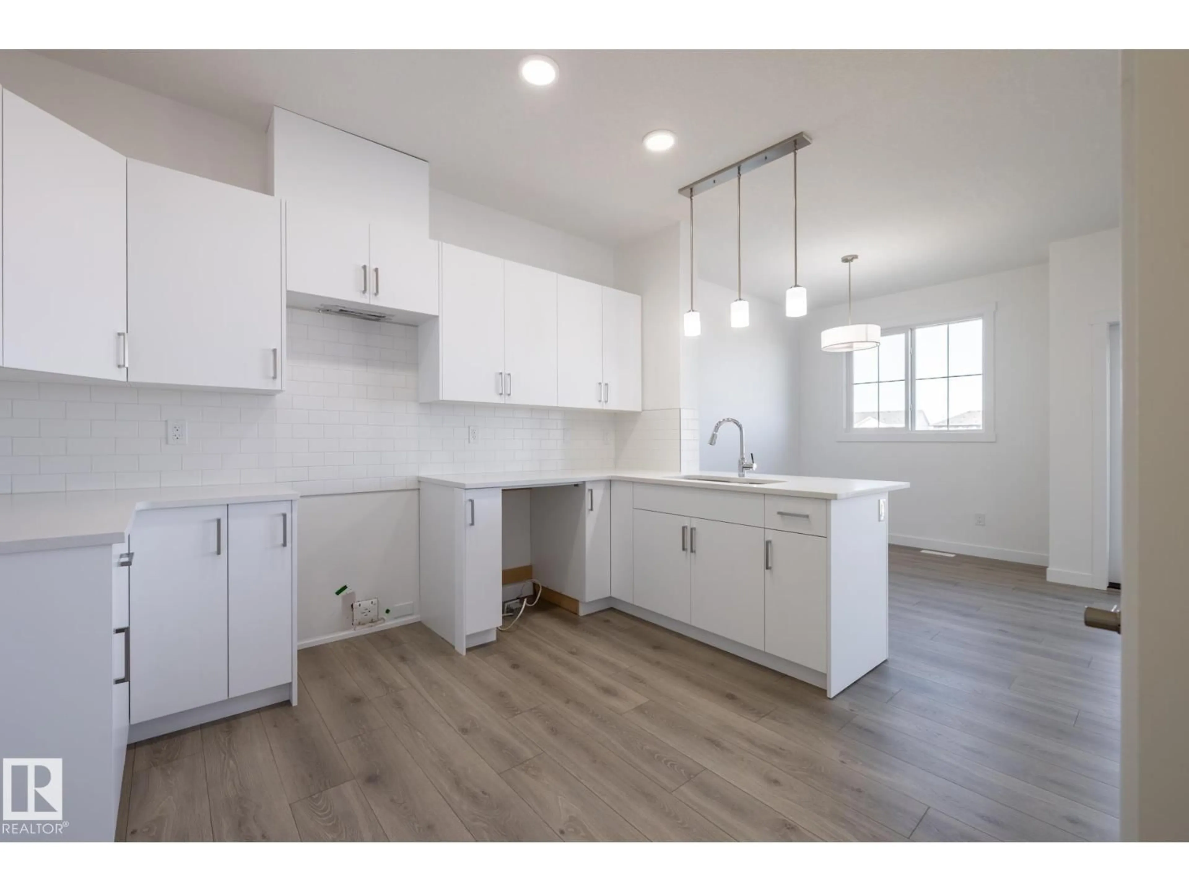 Open concept kitchen, unknown for 7110 - 48 KESWICK CM, Edmonton Alberta T6W5P7