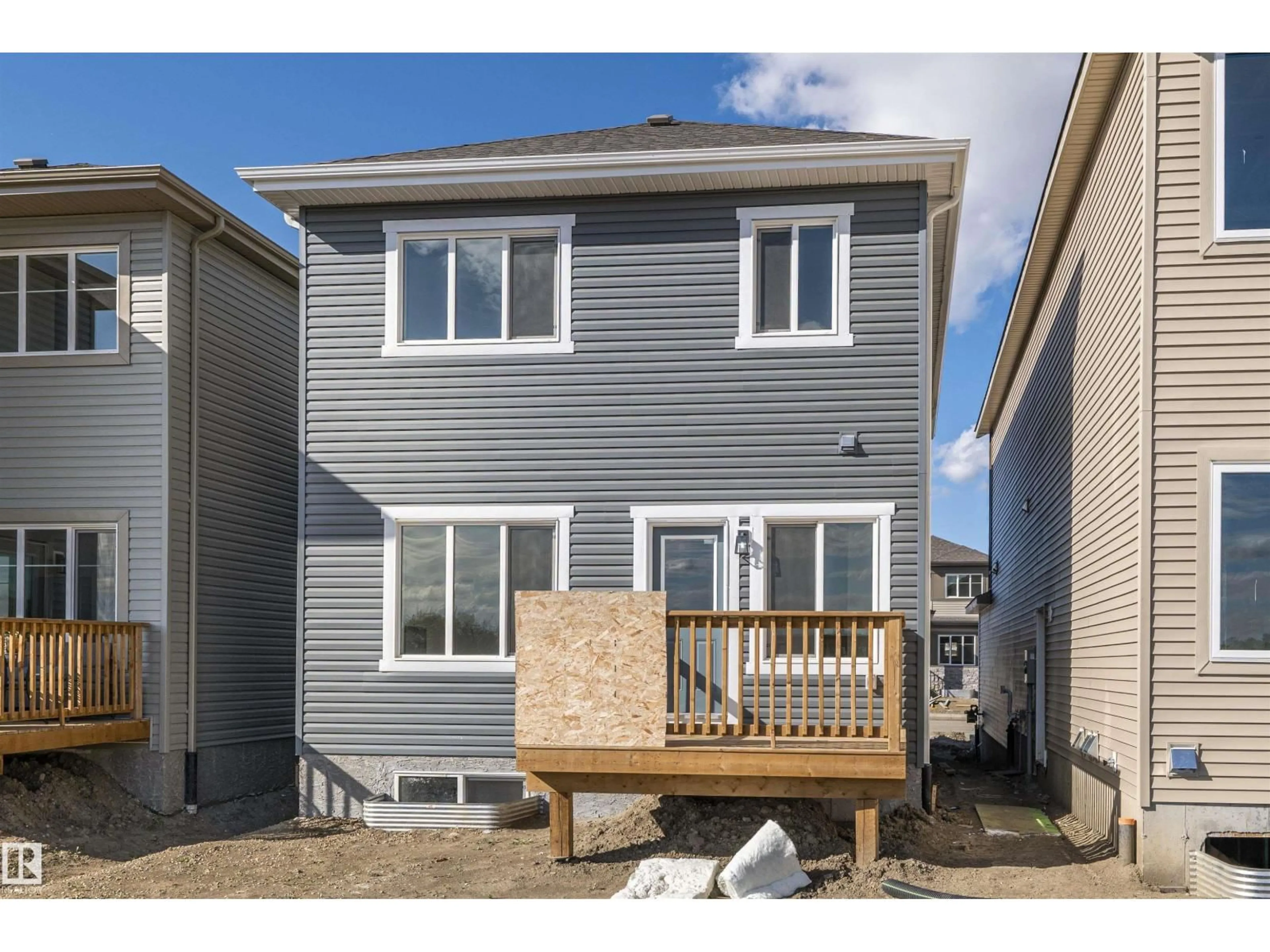 Home with vinyl exterior material, street for 20829 15A AV AV, Edmonton Alberta T6M3N8