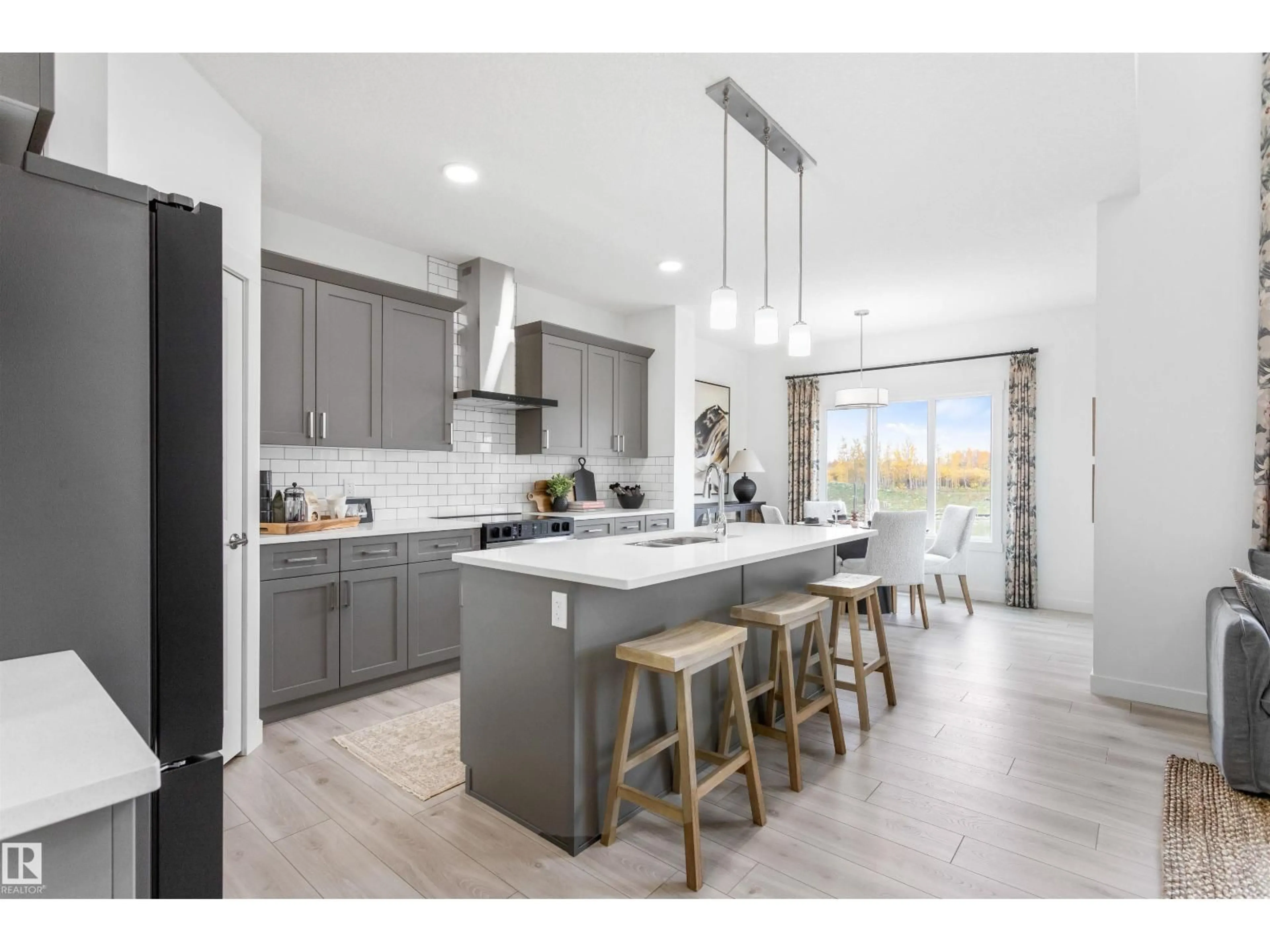 Open concept kitchen, ceramic/tile floor for 20841 15A AV, Edmonton Alberta T6M3H7