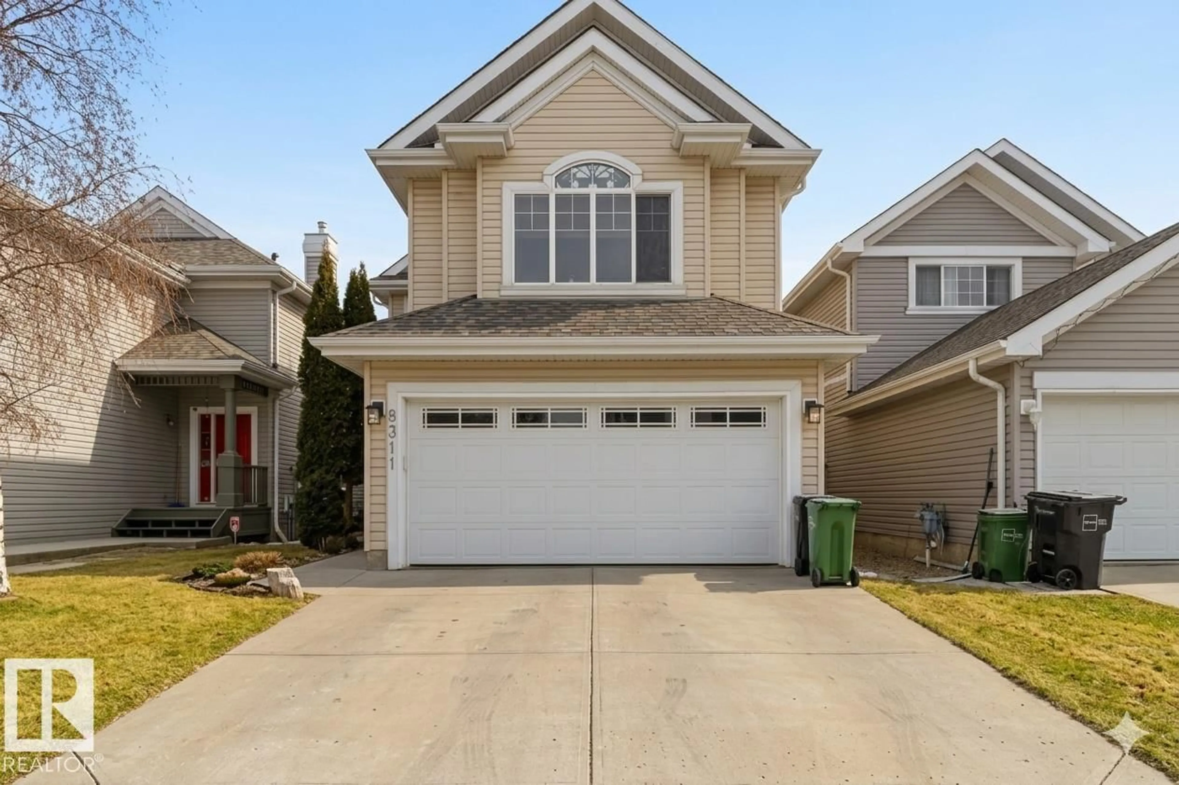 Home with vinyl exterior material, street for SW - 8311 11 AV, Edmonton Alberta T6X1E3