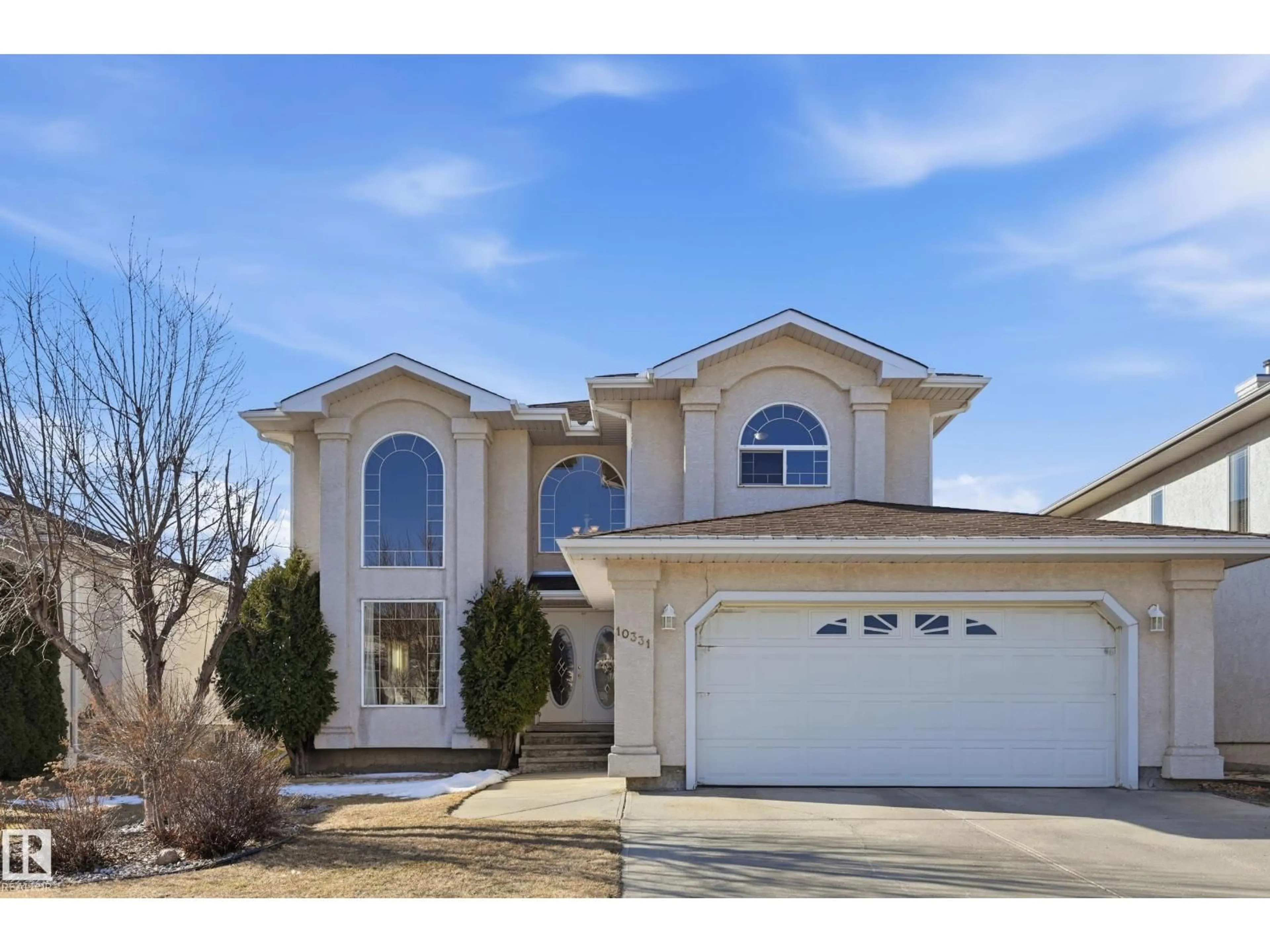 Home with vinyl exterior material, street for NW - 10331 156 AV, Edmonton Alberta T5X6B4