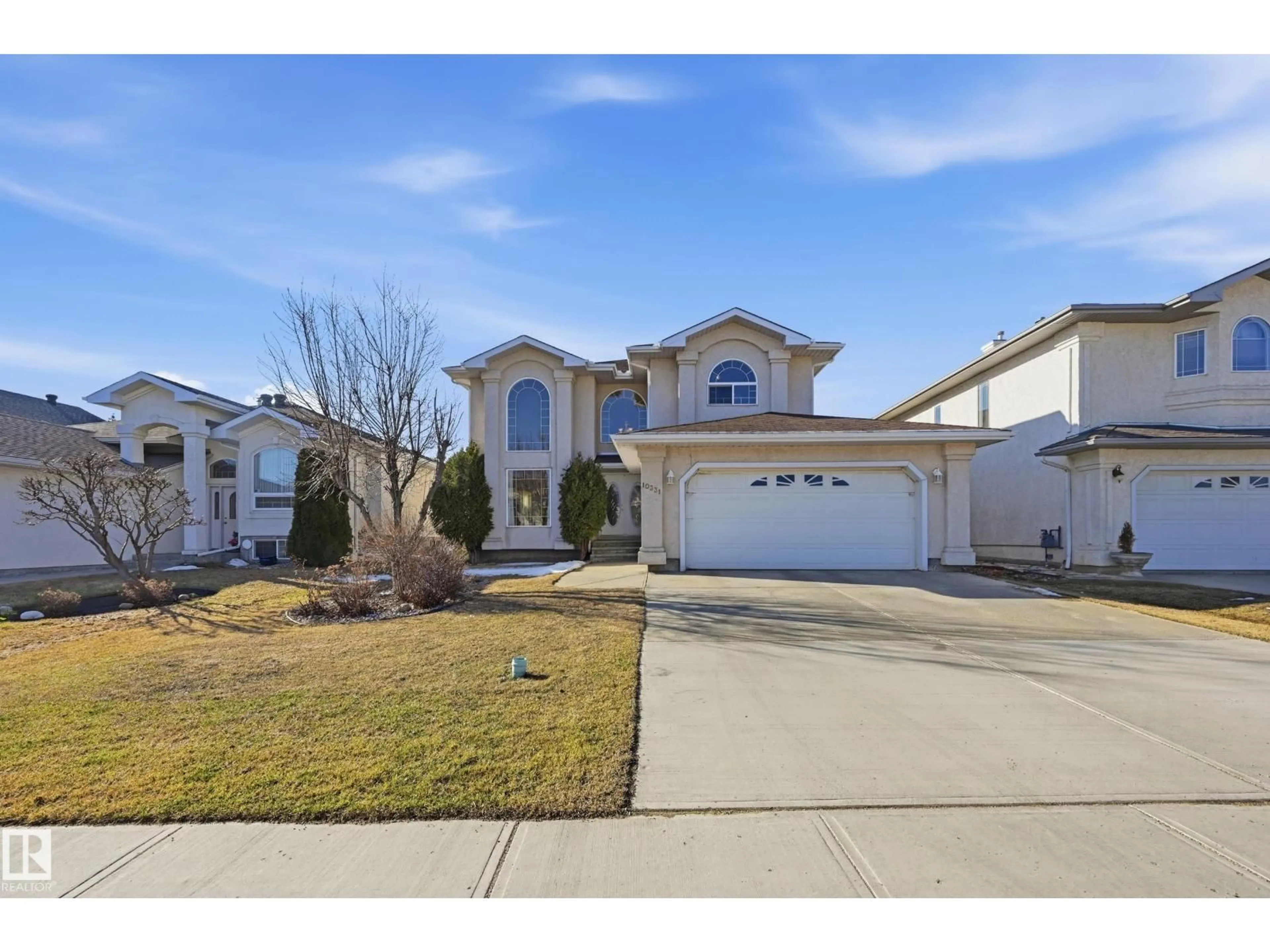Home with vinyl exterior material, street for NW - 10331 156 AV, Edmonton Alberta T5X6B4