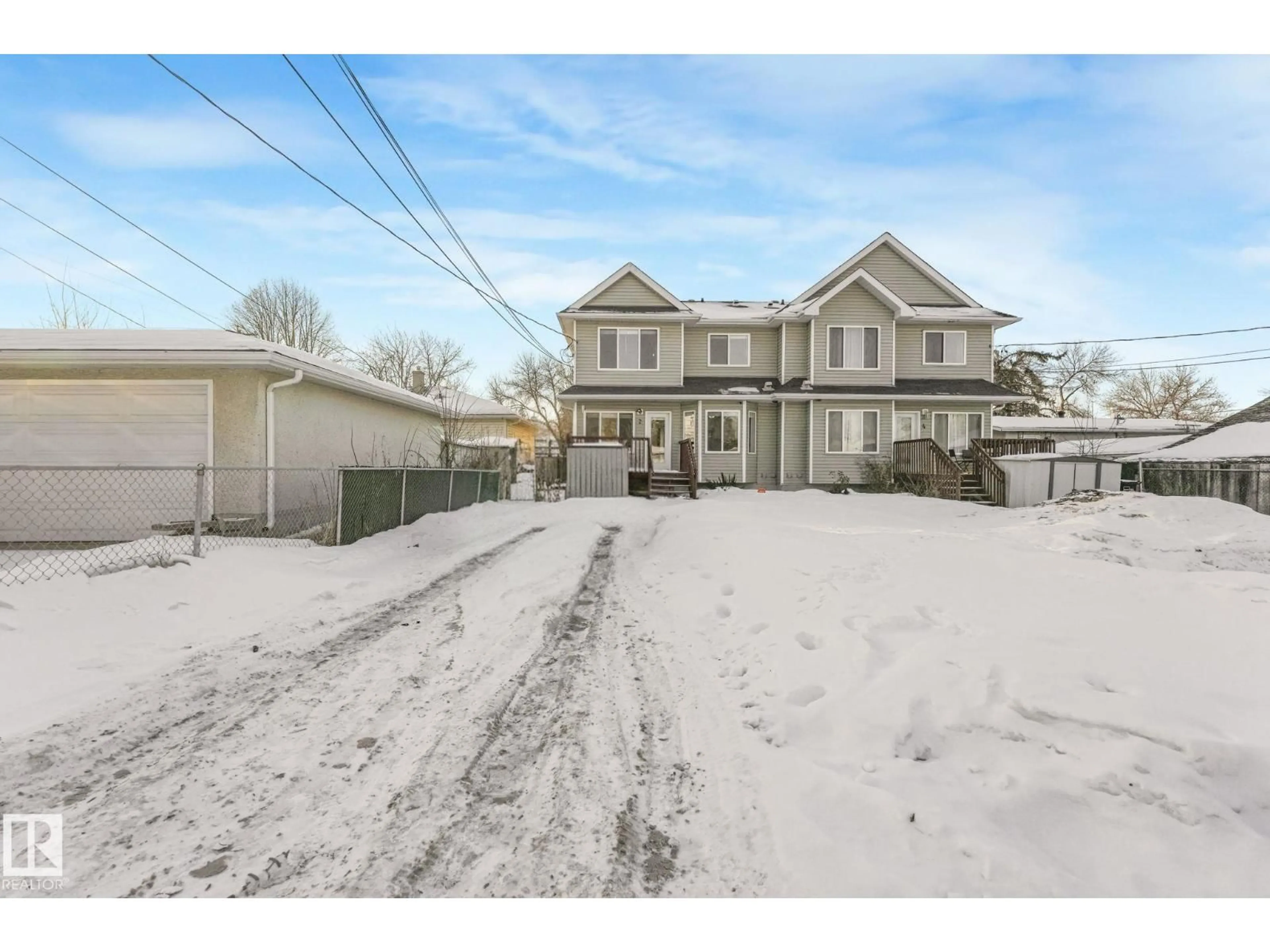 A pic from outside/outdoor area/front of a property/back of a property/a pic from drone, street for #2 - 11813 43 ST, Edmonton Alberta T5W2P3