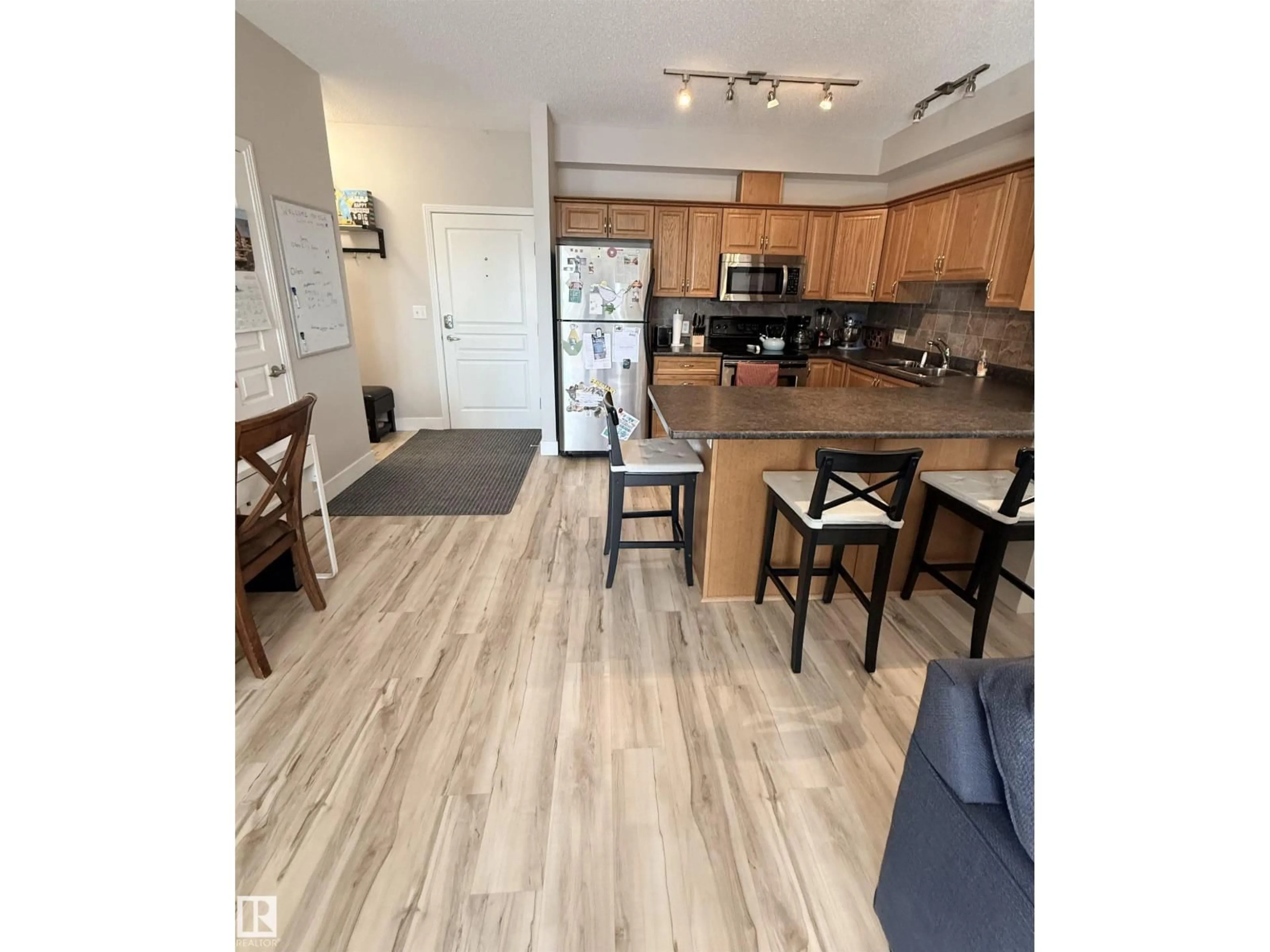 Open concept kitchen, unknown for #309 - 8931 156 ST, Edmonton Alberta T5R1Y6