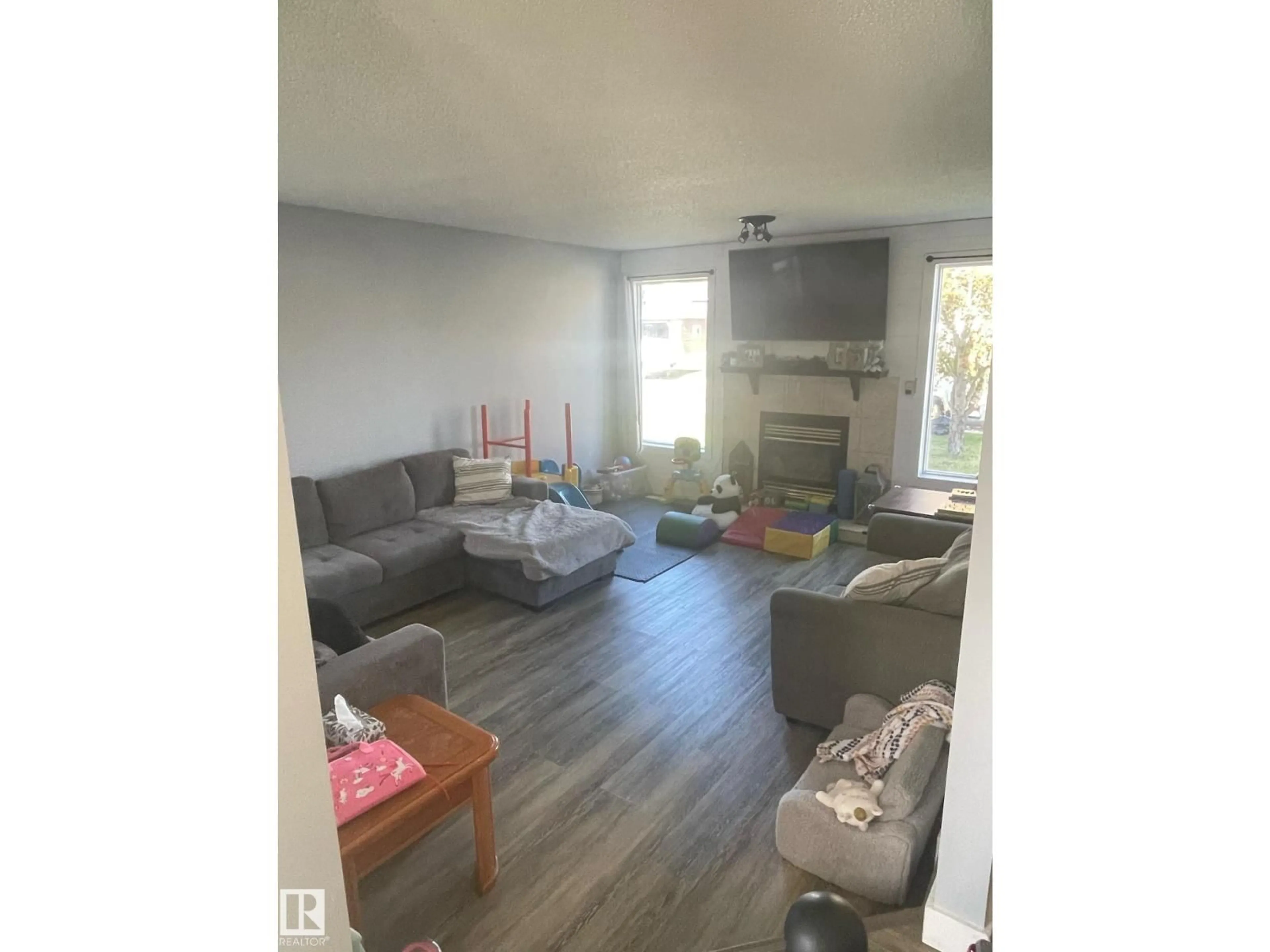 Living room with furniture, wood/laminate floor for 5108 58 AV, Elk Point Alberta T0A1A0