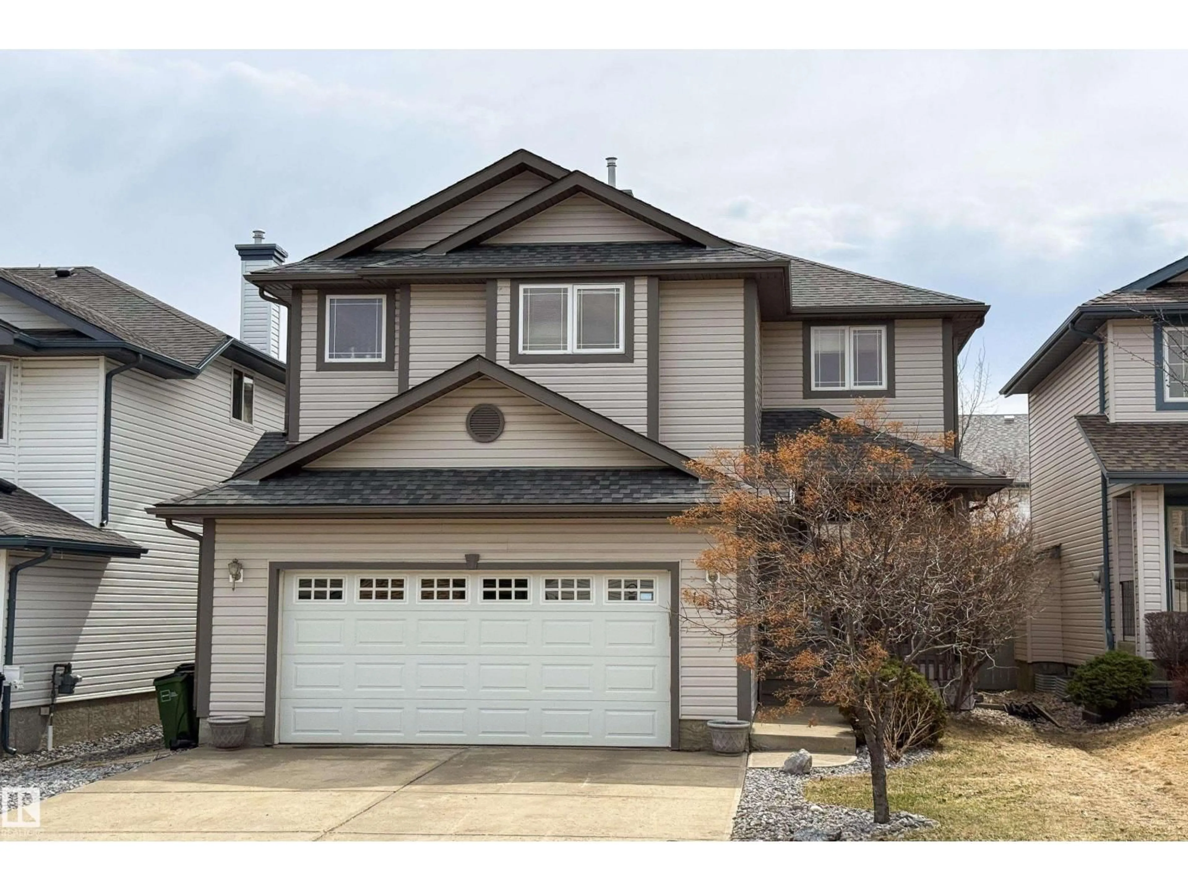 Home with vinyl exterior material, street for 1205 ORMSBY LN, Edmonton Alberta T5T6G8