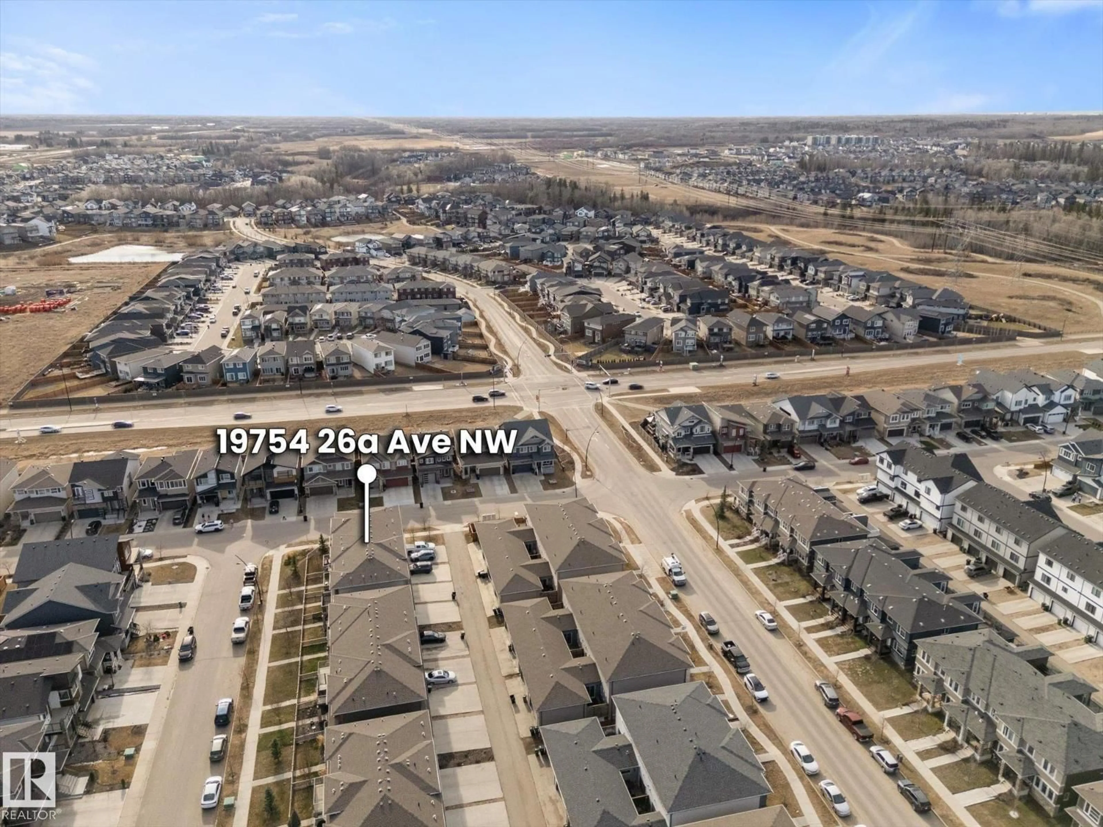 A pic from outside/outdoor area/front of a property/back of a property/a pic from drone, street for 19754 26A AV, Edmonton Alberta T6M0W9