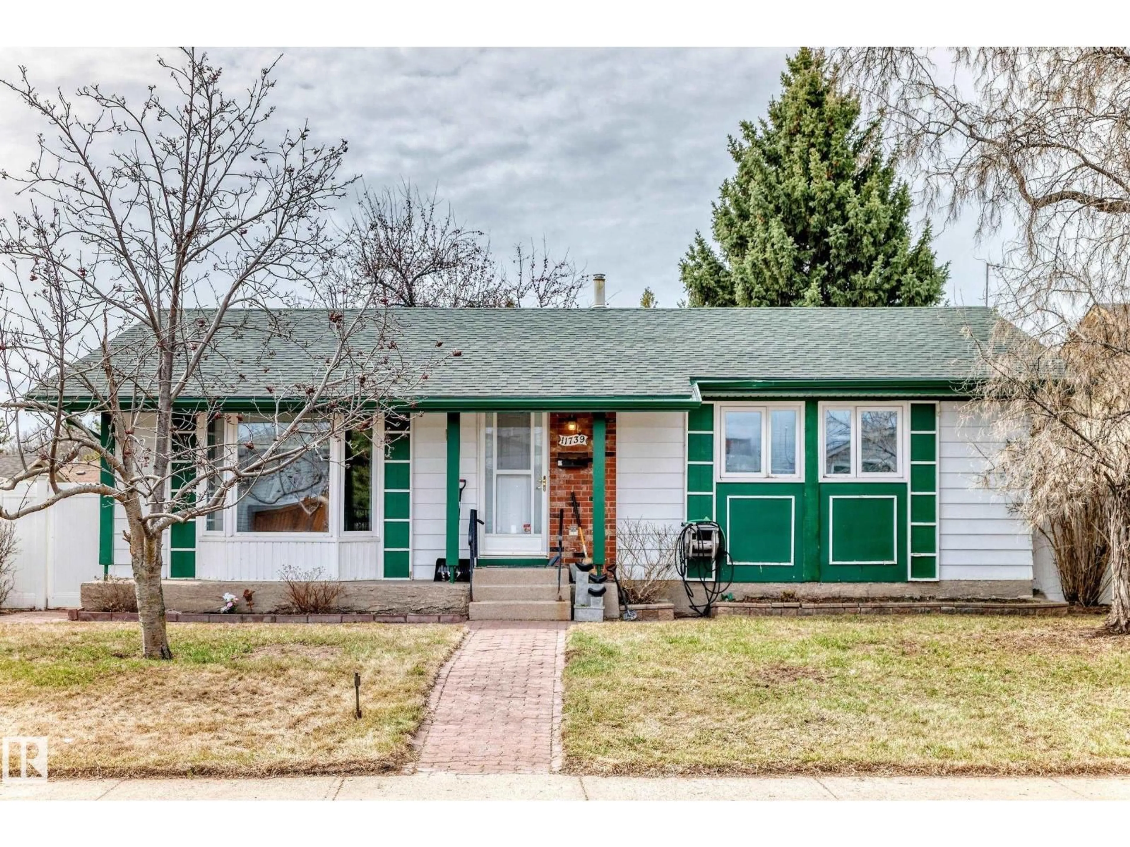 Home with vinyl exterior material, street for 11739 152A AV, Edmonton Alberta T5X1E5