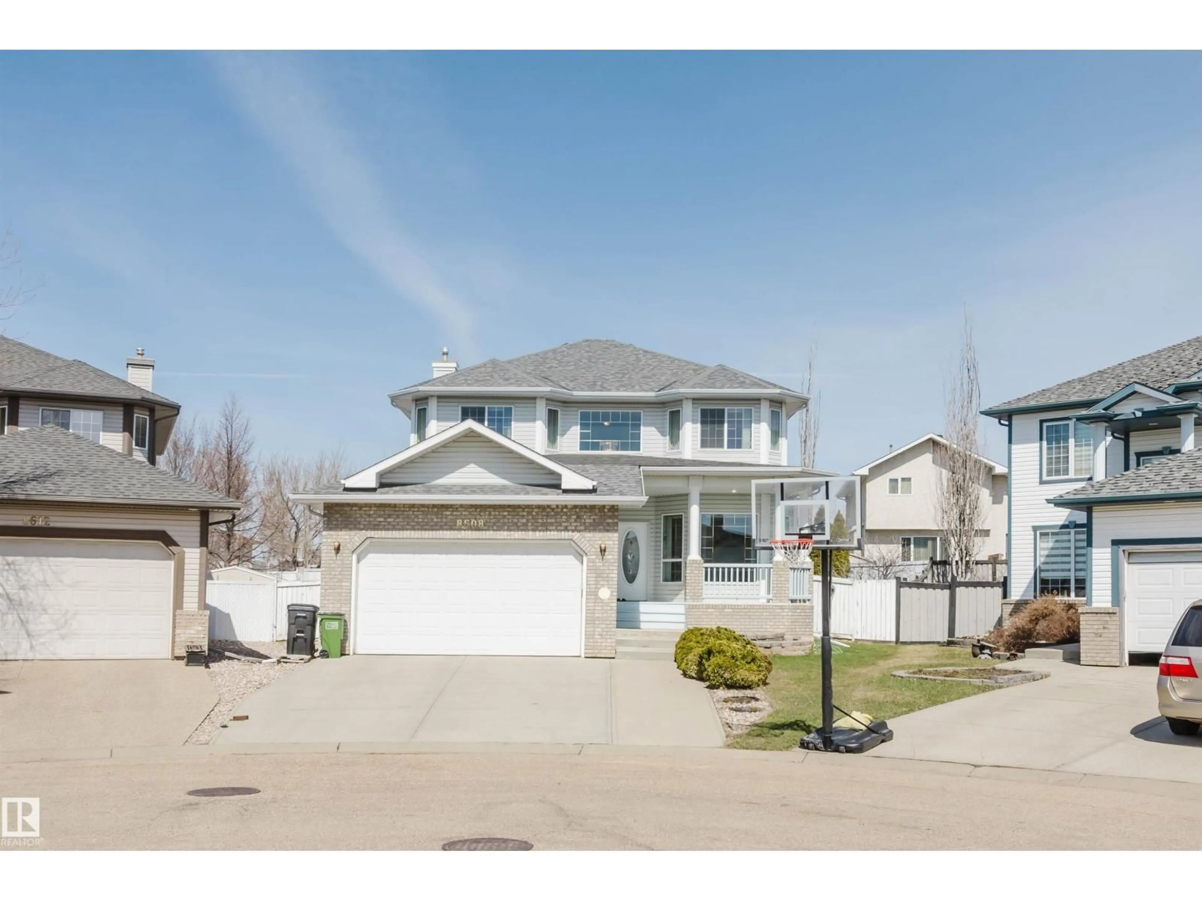 Home with vinyl exterior material, street for 8608 160A AV, Edmonton Alberta T5Z3K2