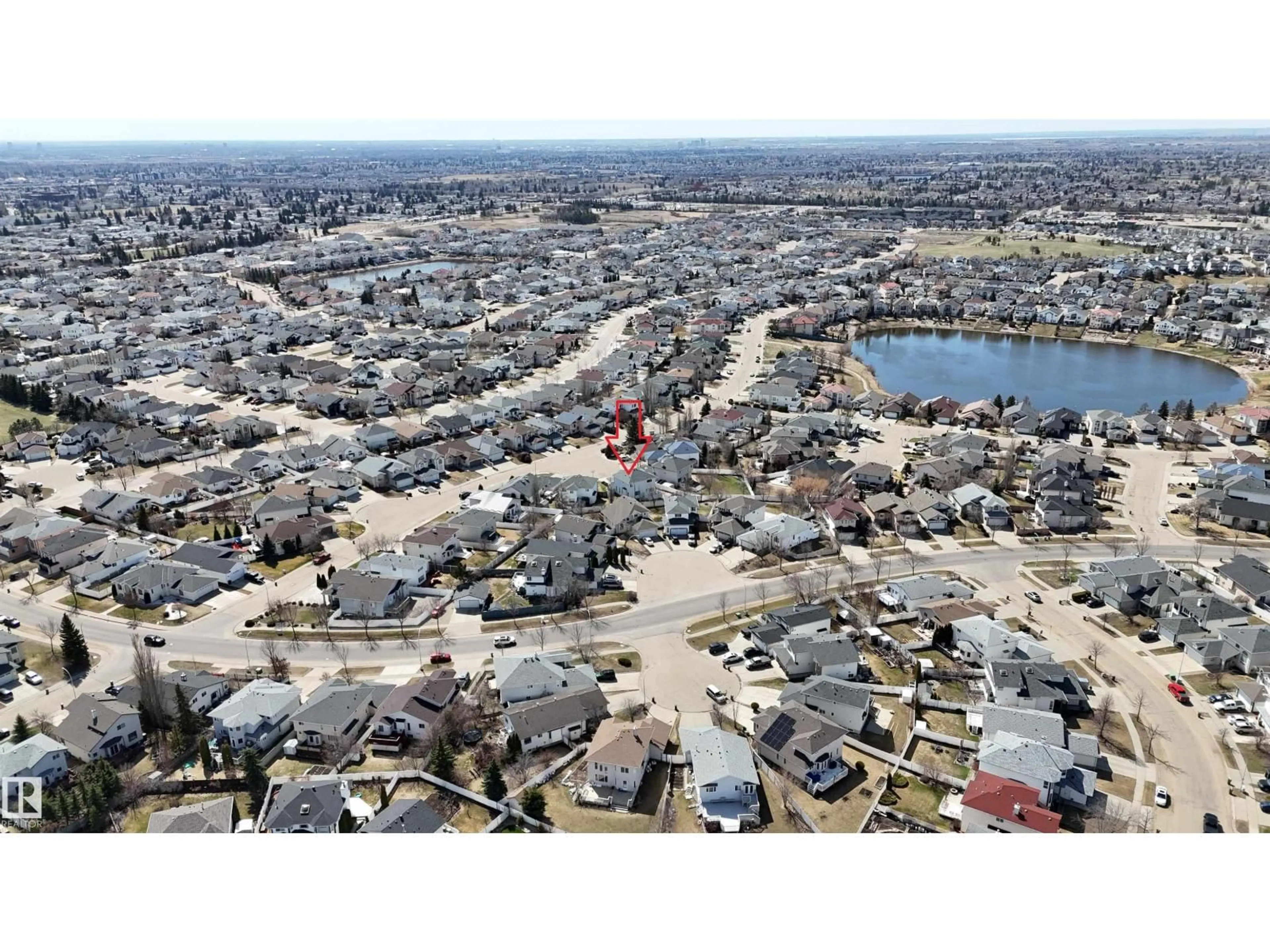 A pic from outside/outdoor area/front of a property/back of a property/a pic from drone, water/lake/river/ocean view for 8608 160A AV, Edmonton Alberta T5Z3K2