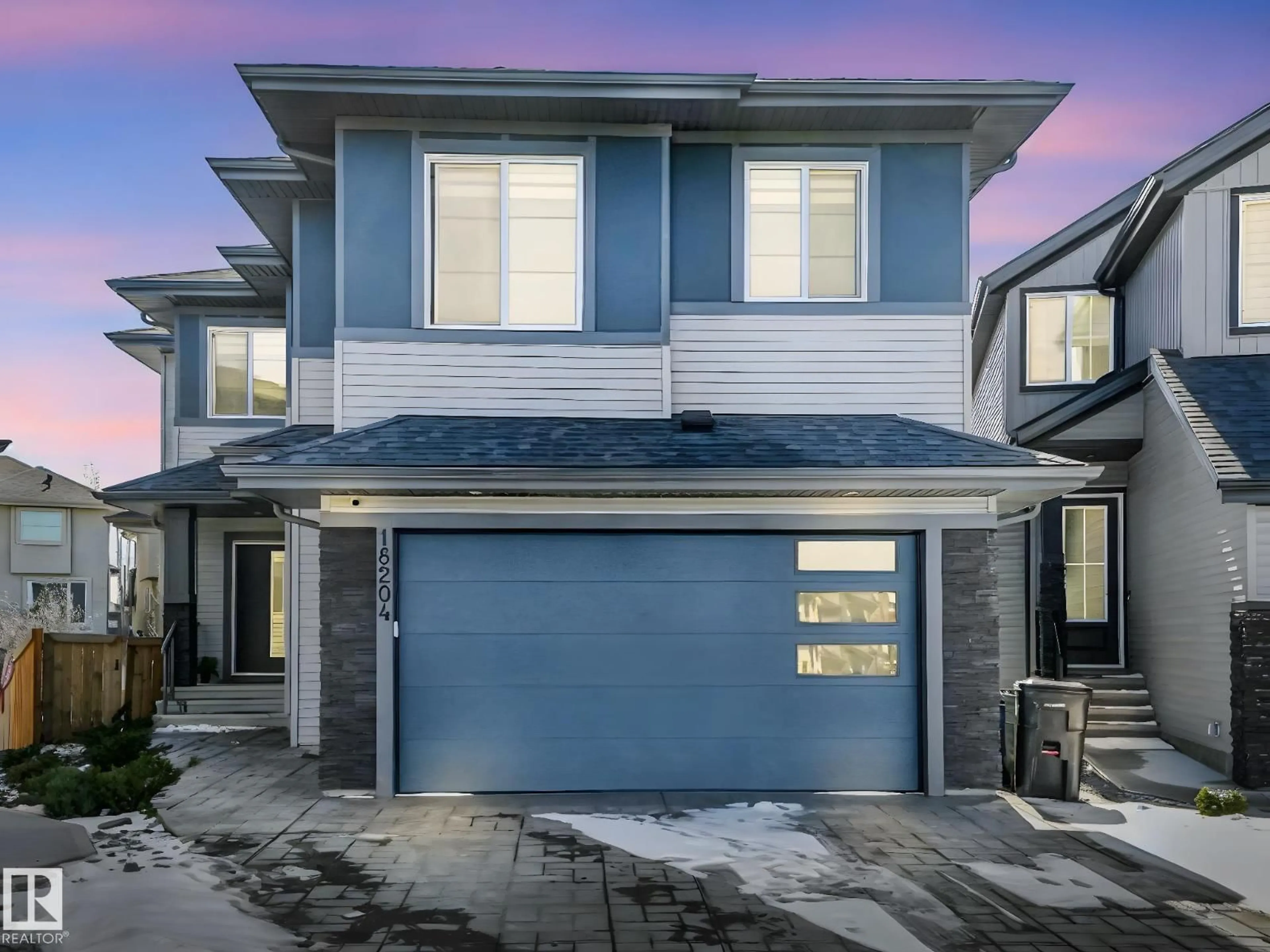 Home with vinyl exterior material, street for 18204 90 ST, Edmonton Alberta T5Z0S7