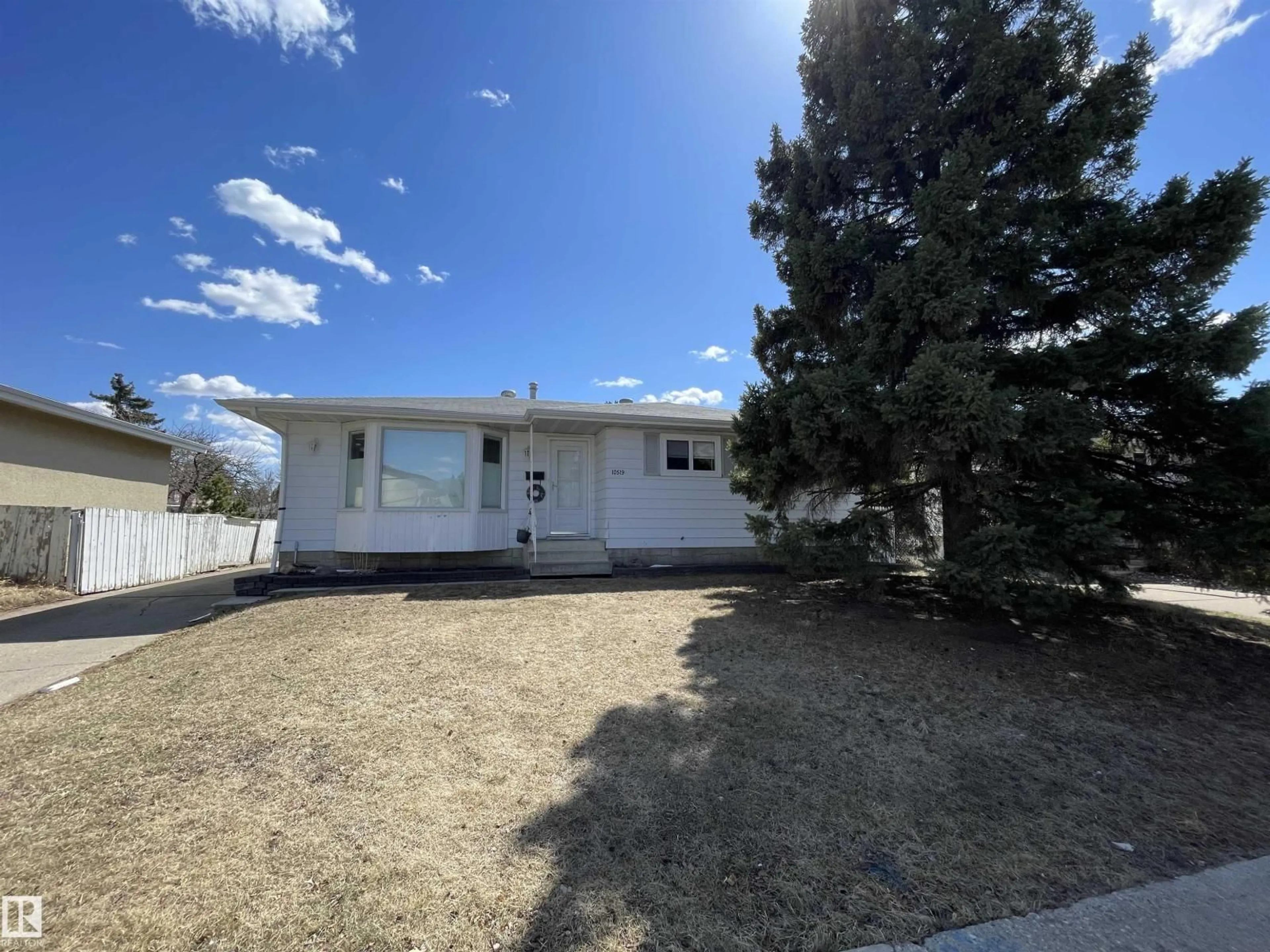 Home with vinyl exterior material, street for 10519 36A AV, Edmonton Alberta T6J2H7