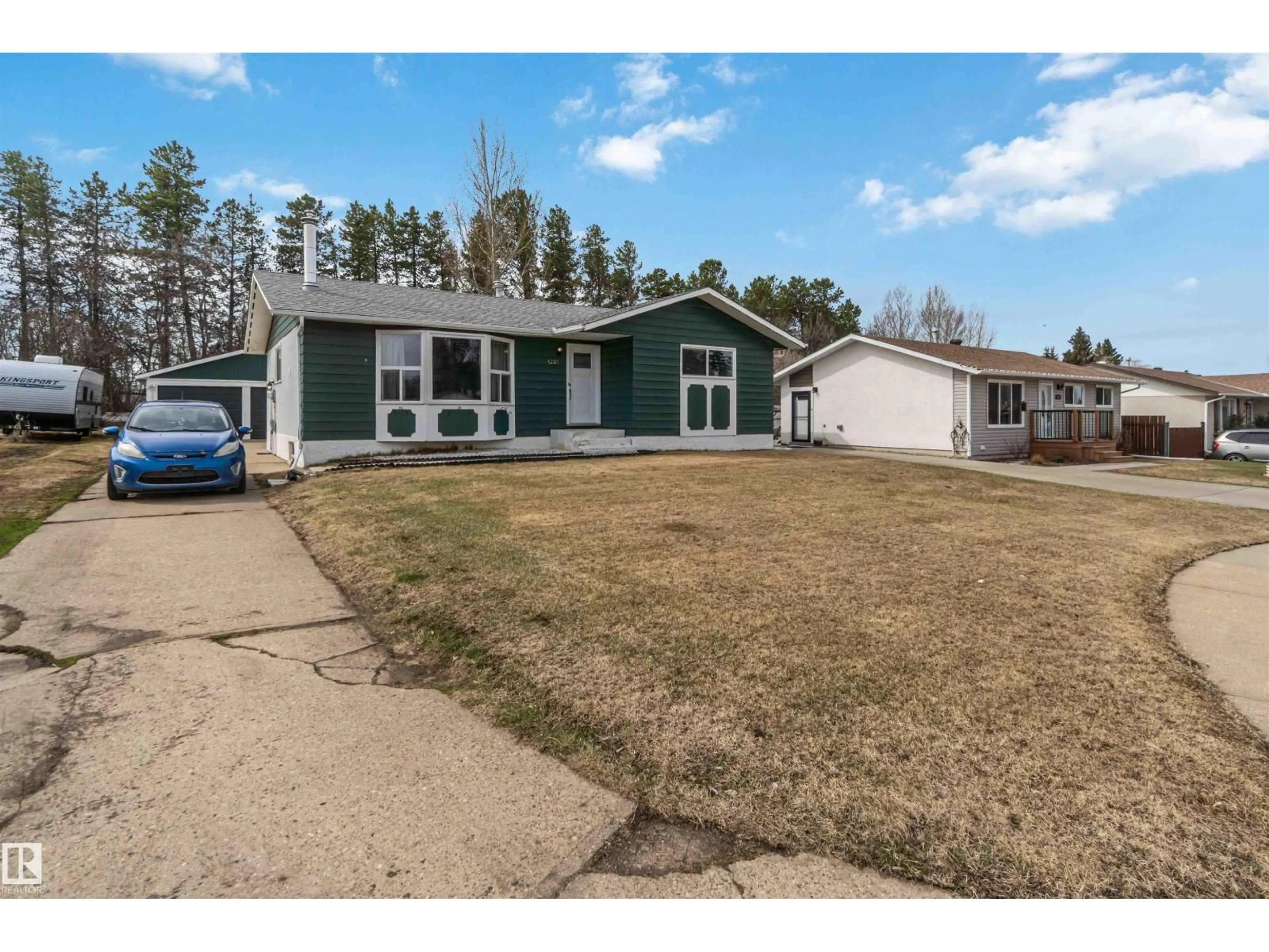 A pic from outside/outdoor area/front of a property/back of a property/a pic from drone, street for 5207 52 AV, Bon Accord Alberta T0A0K0