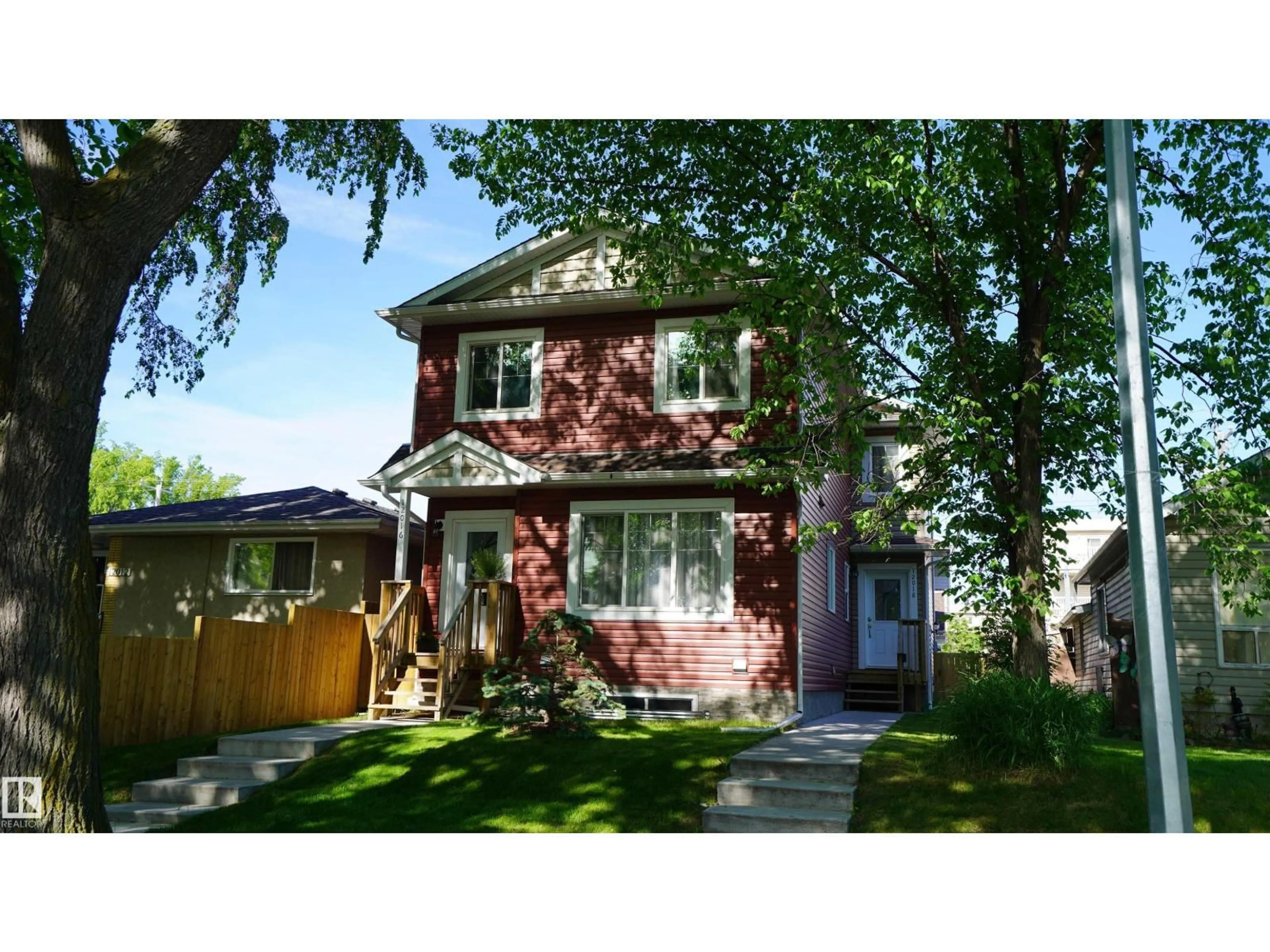 Home with vinyl exterior material, street for NW - 12018 65 ST, Edmonton Alberta T5W4L7
