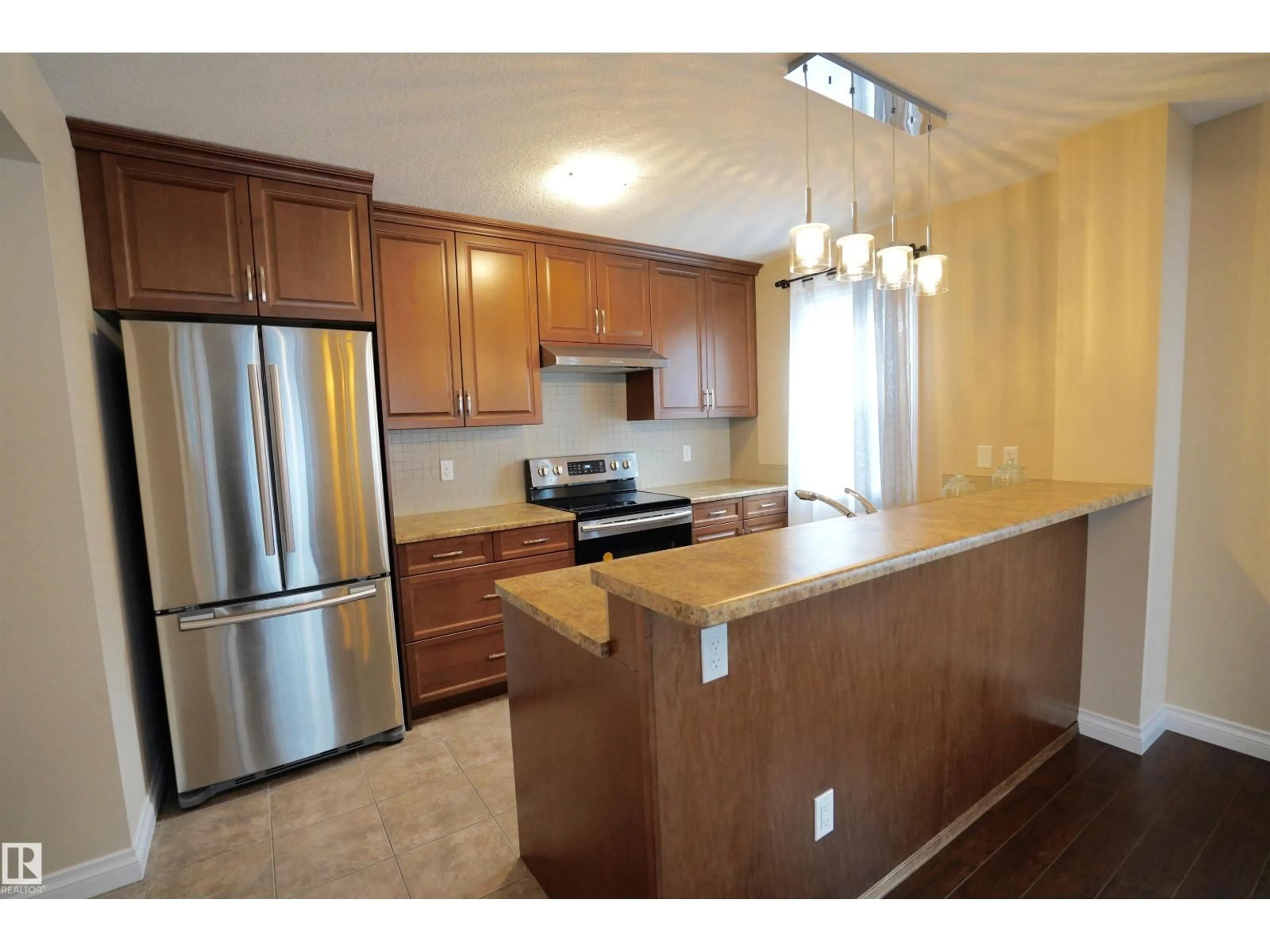 Open concept kitchen, unknown for NW - 12018 65 ST, Edmonton Alberta T5W4L7