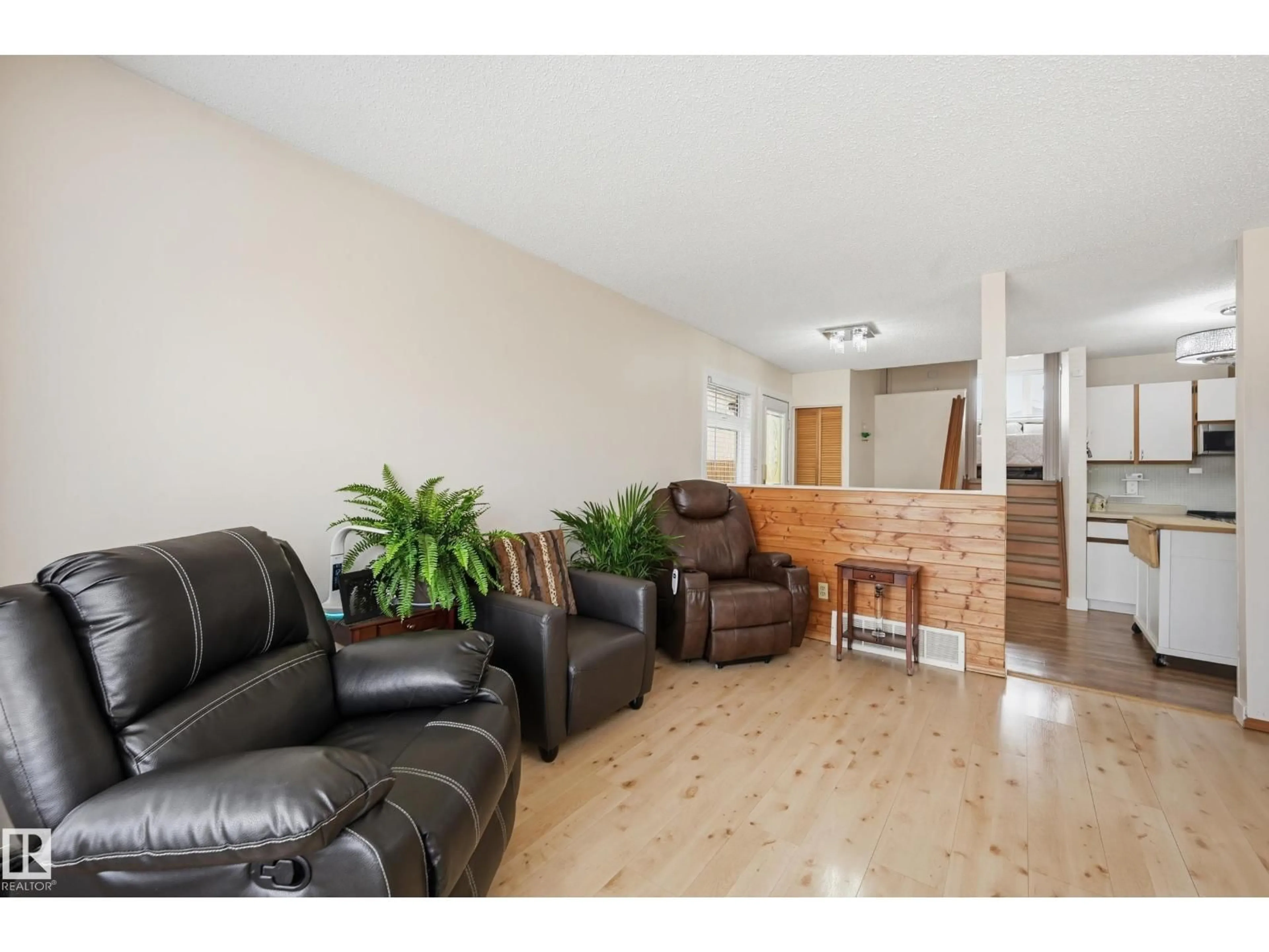 Living room with furniture, unknown for 8305 157 AV, Edmonton Alberta T5Z2P8