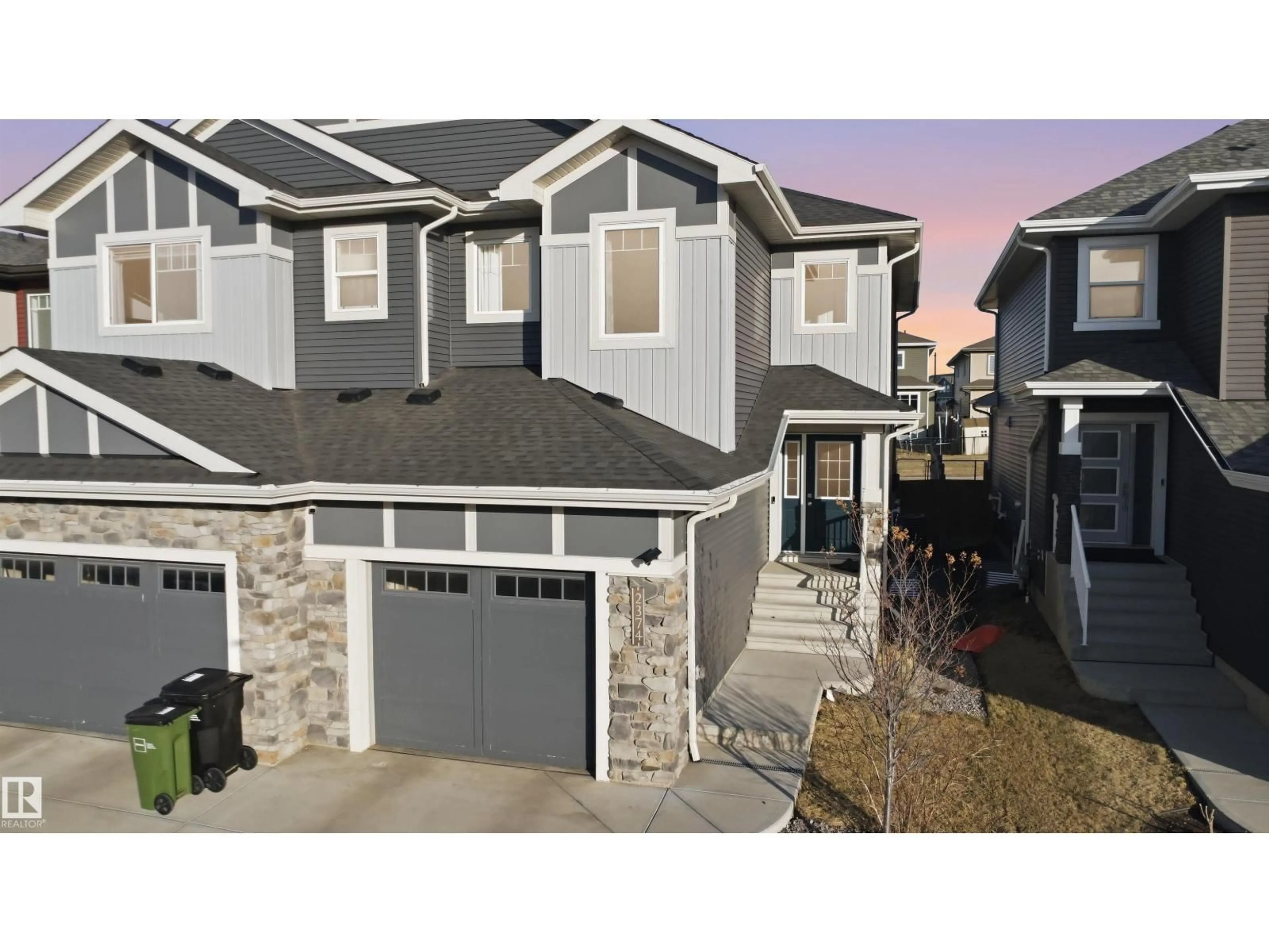 Home with vinyl exterior material, street for 2374 WONNACOTT CR, Edmonton Alberta T6X2J4