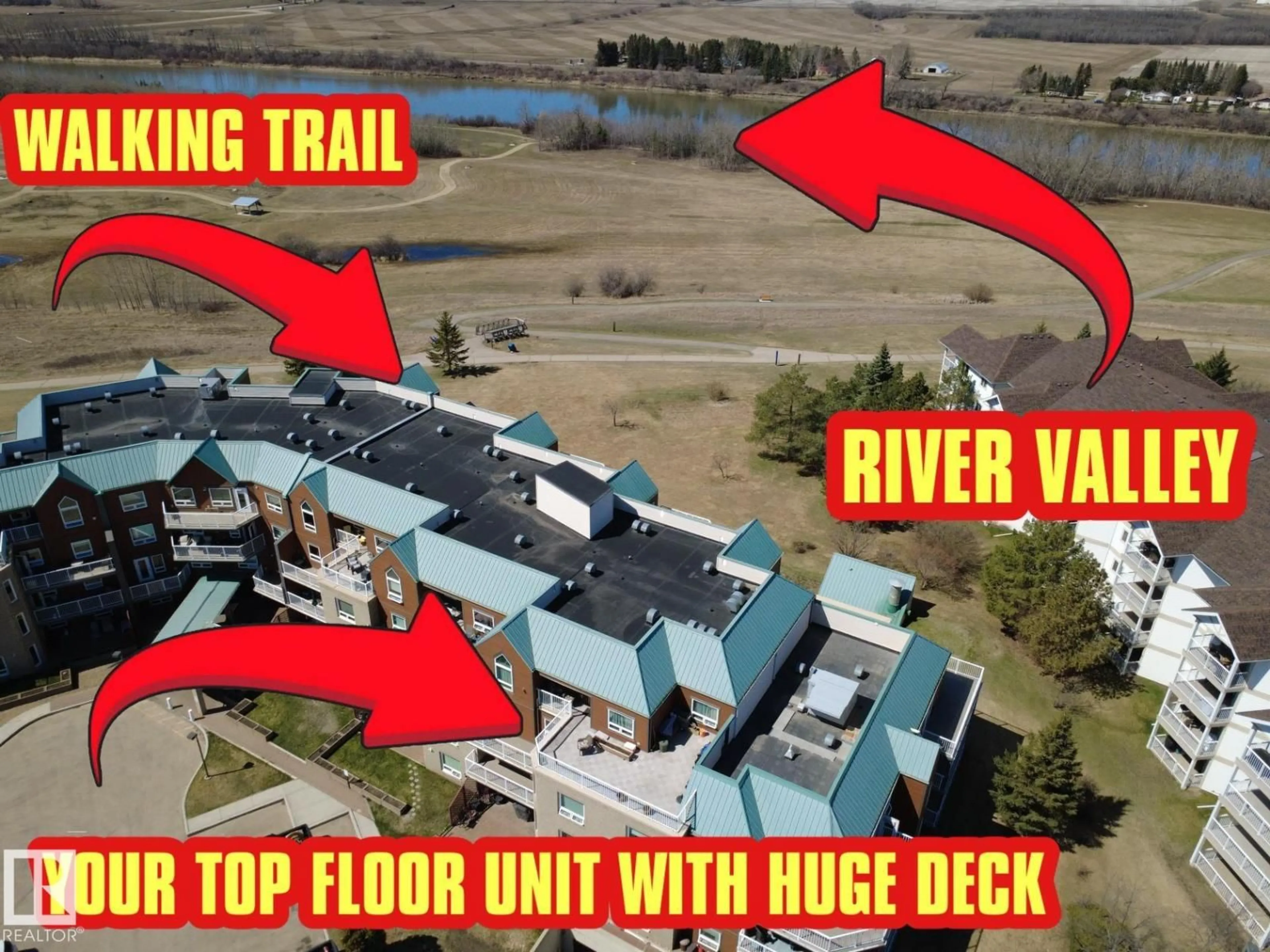 A pic from outside/outdoor area/front of a property/back of a property/a pic from drone, water/lake/river/ocean view for 410 9926 100, Fort Saskatchewan Alberta T8L4E3