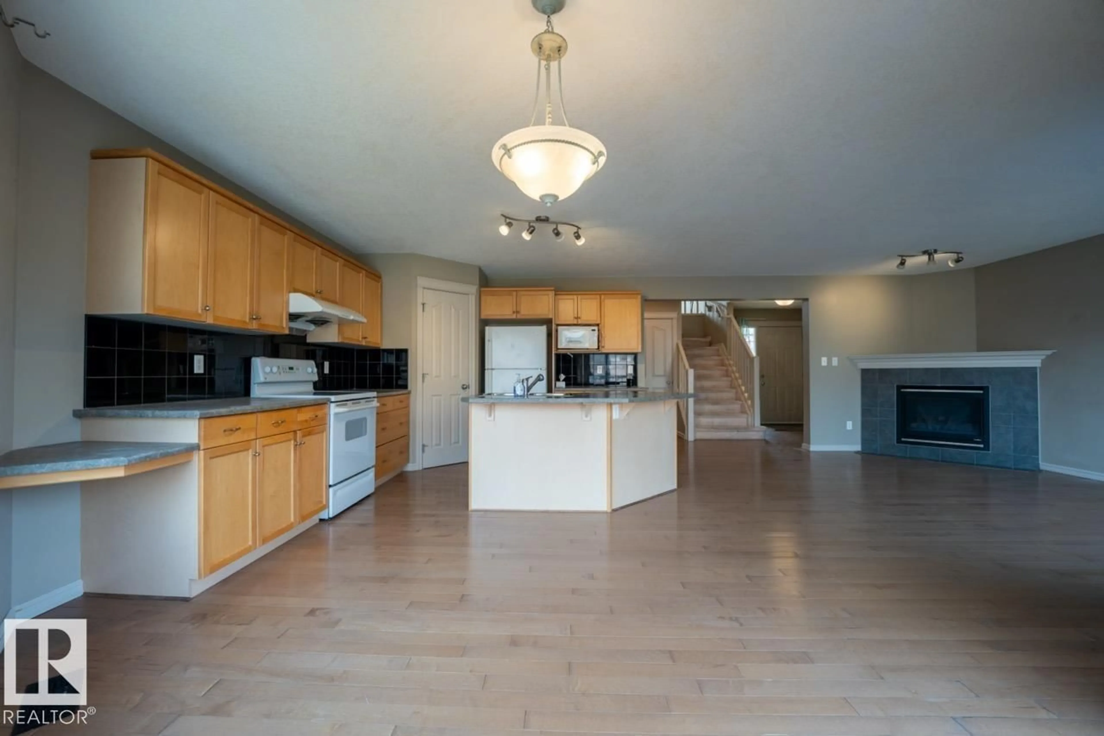 Open concept kitchen, unknown for 1431 HODGSON WAY, Edmonton Alberta T6R3N5