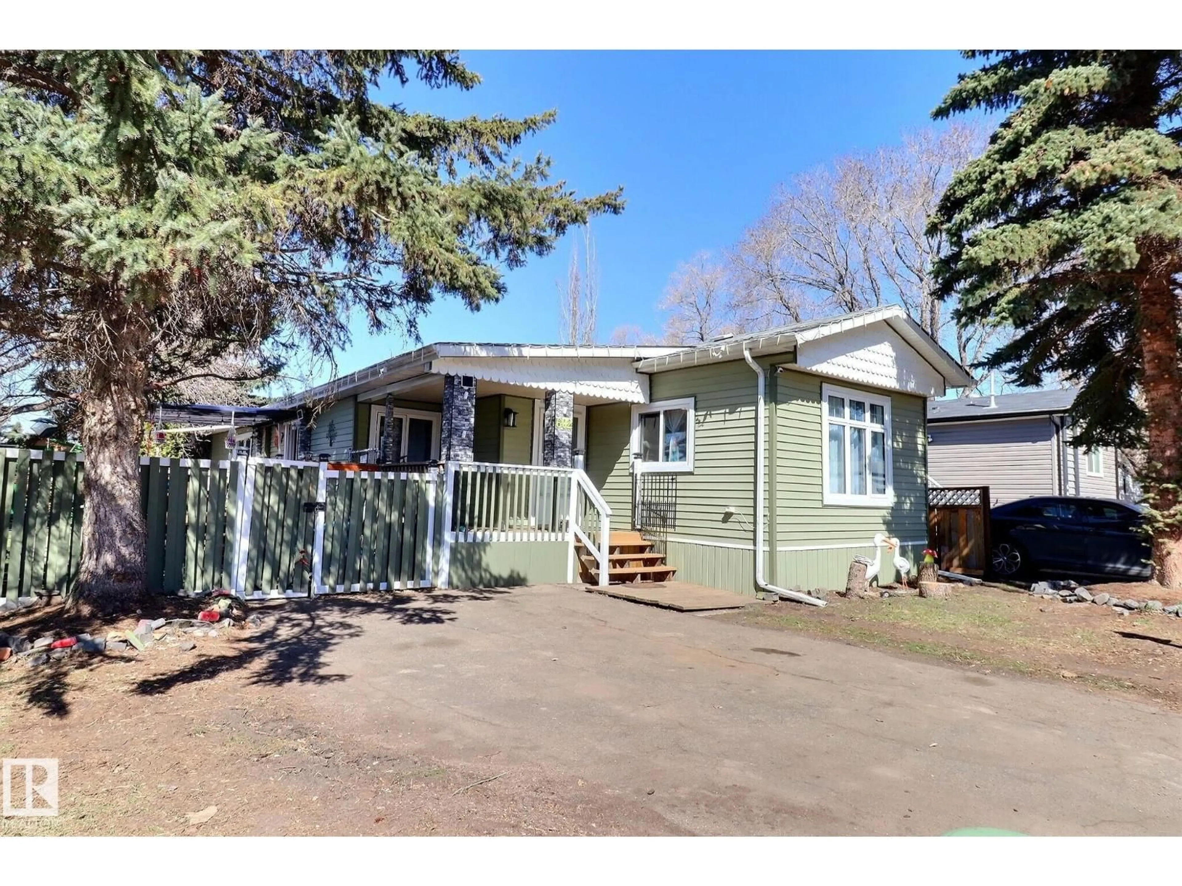 Home with vinyl exterior material, street for 602 EVERGREEN PA, Edmonton Alberta T5Y4M2