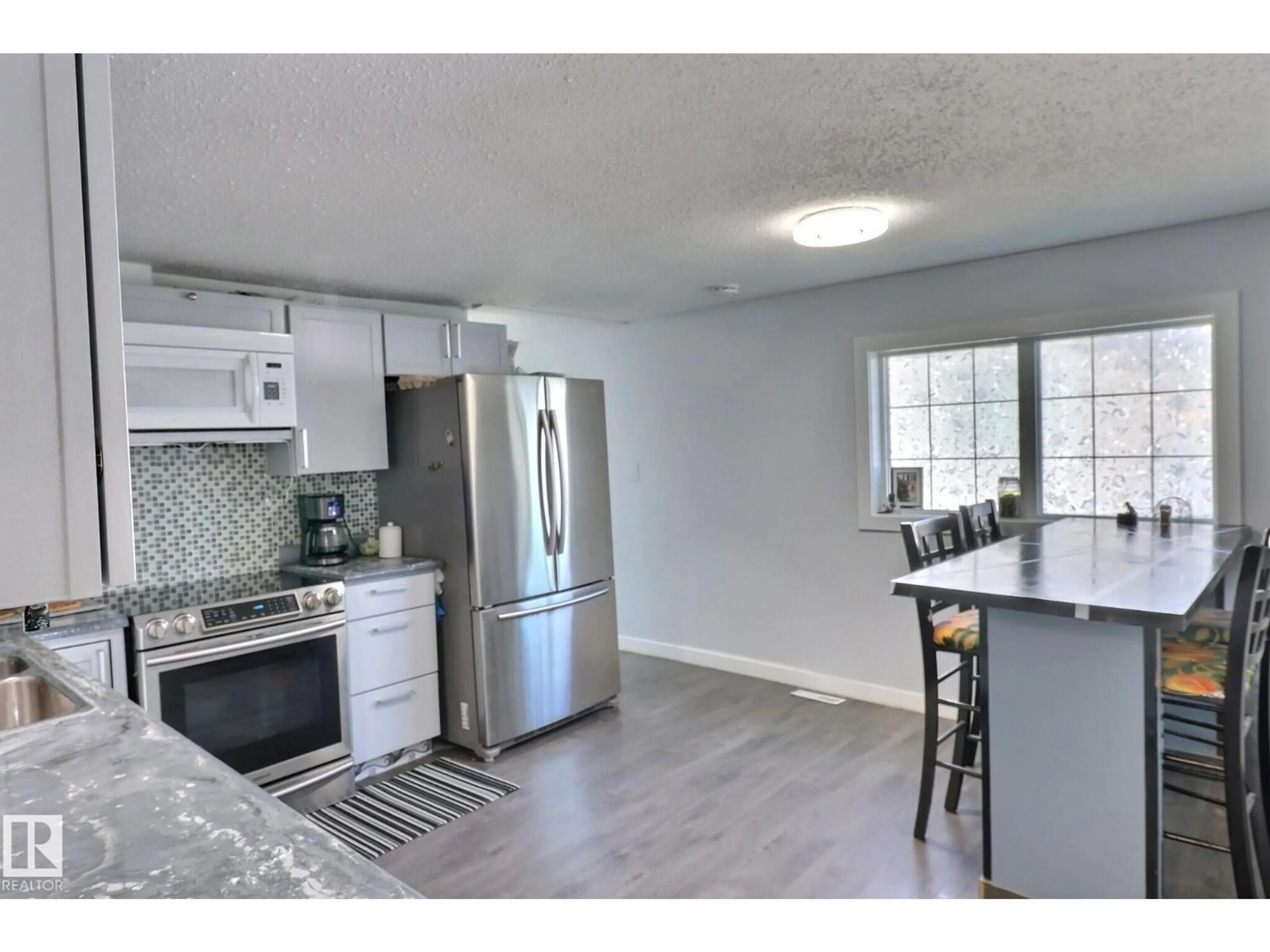 Open concept kitchen, ceramic/tile floor for 602 EVERGREEN PA, Edmonton Alberta T5Y4M2