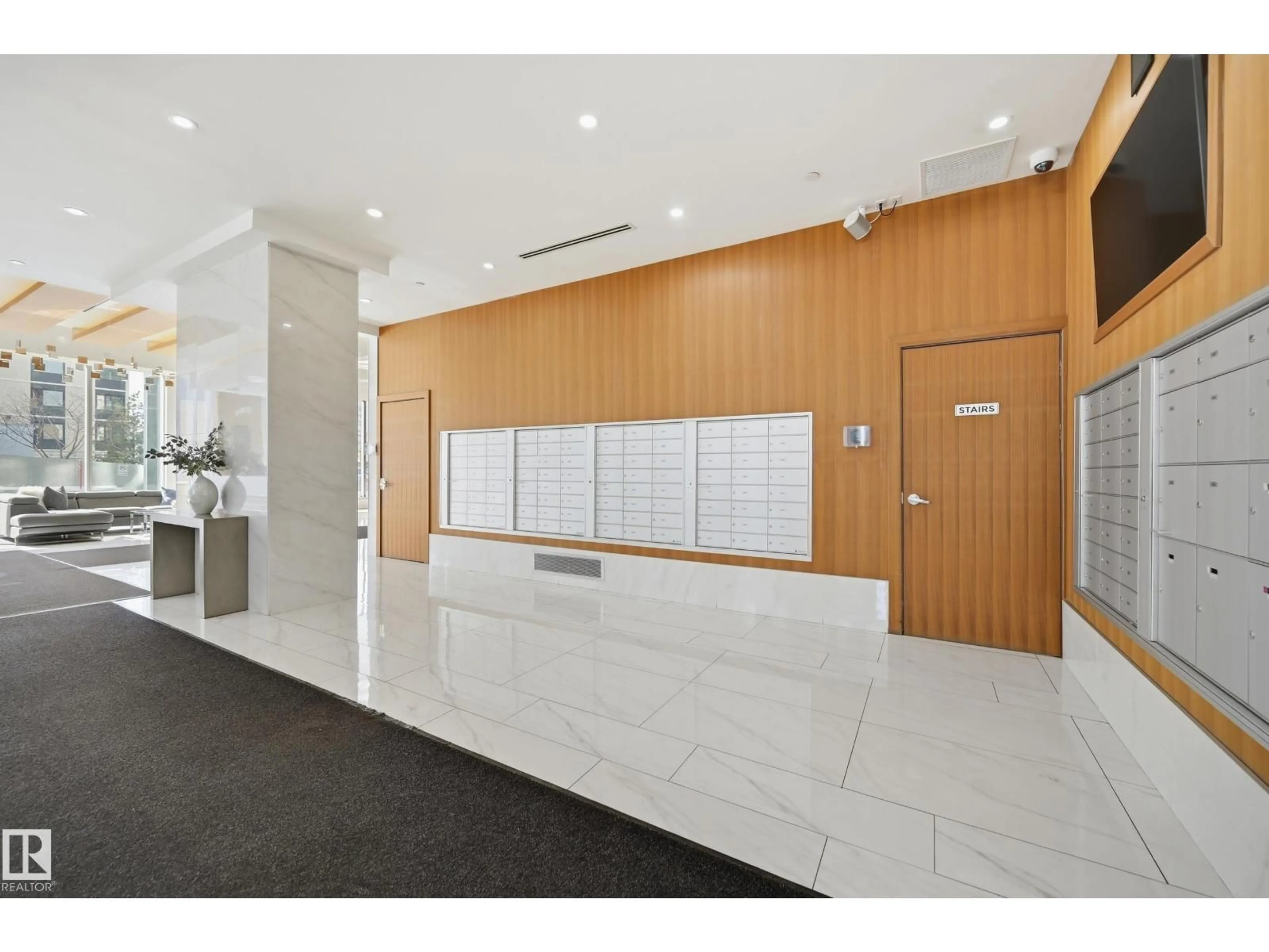 Indoor foyer for 1302 JASPER AV, Edmonton Alberta T5K0P1