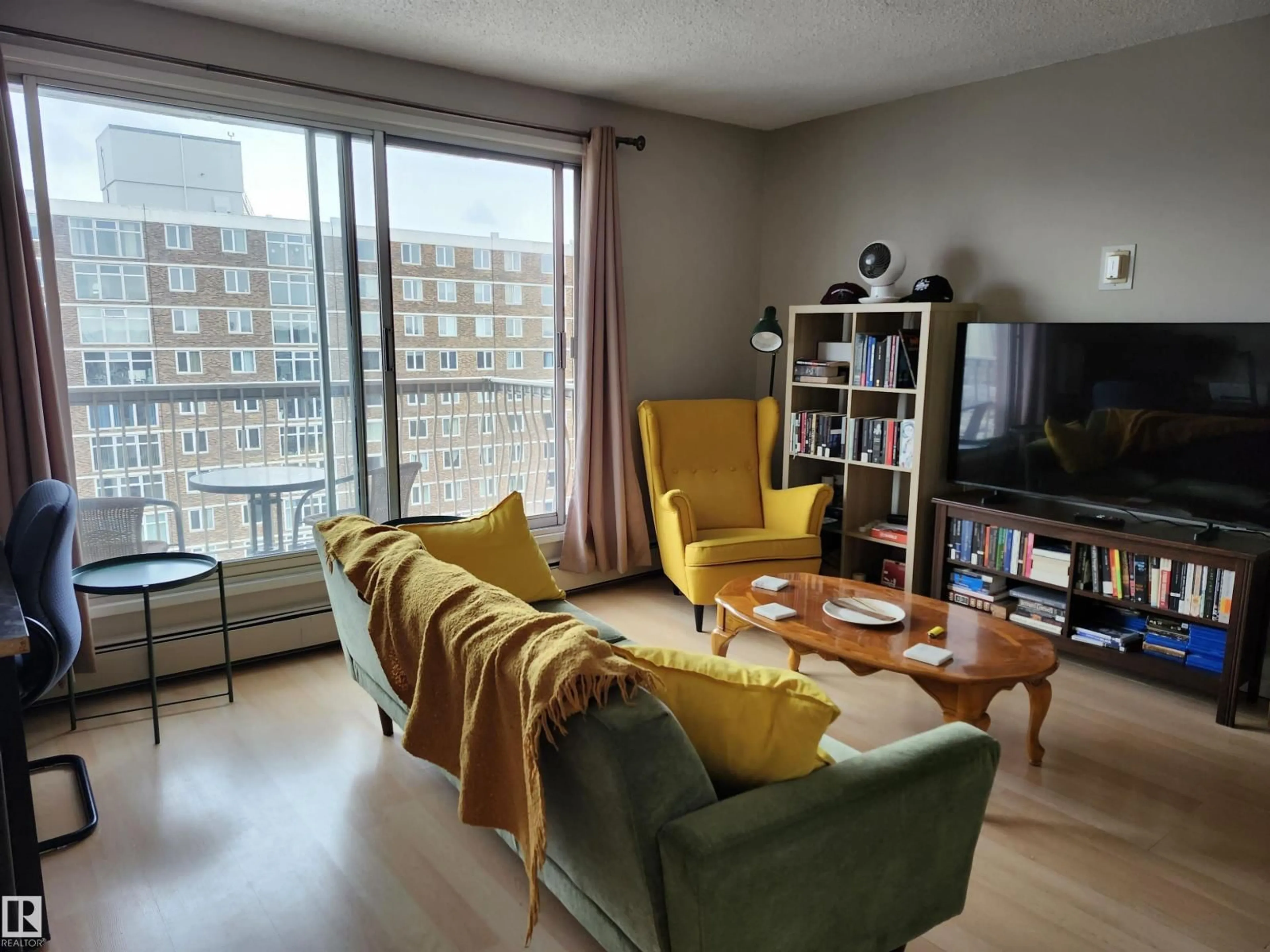 Living room with furniture, unknown for 10150 - 1505 117 ST, Edmonton Alberta T5K2J2