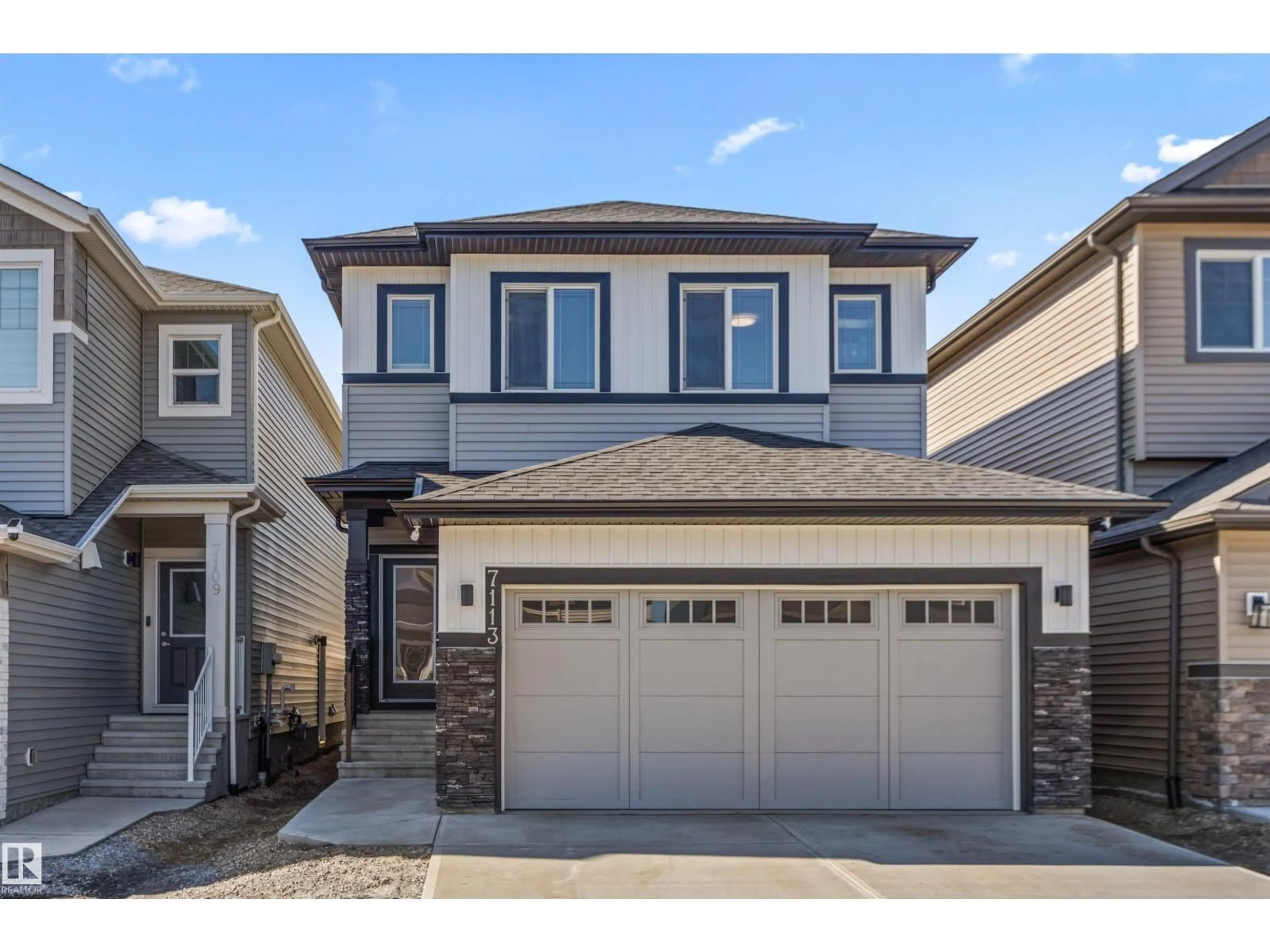 Home with vinyl exterior material, street for NW - 7113 177A AV, Edmonton Alberta T5Z0T4