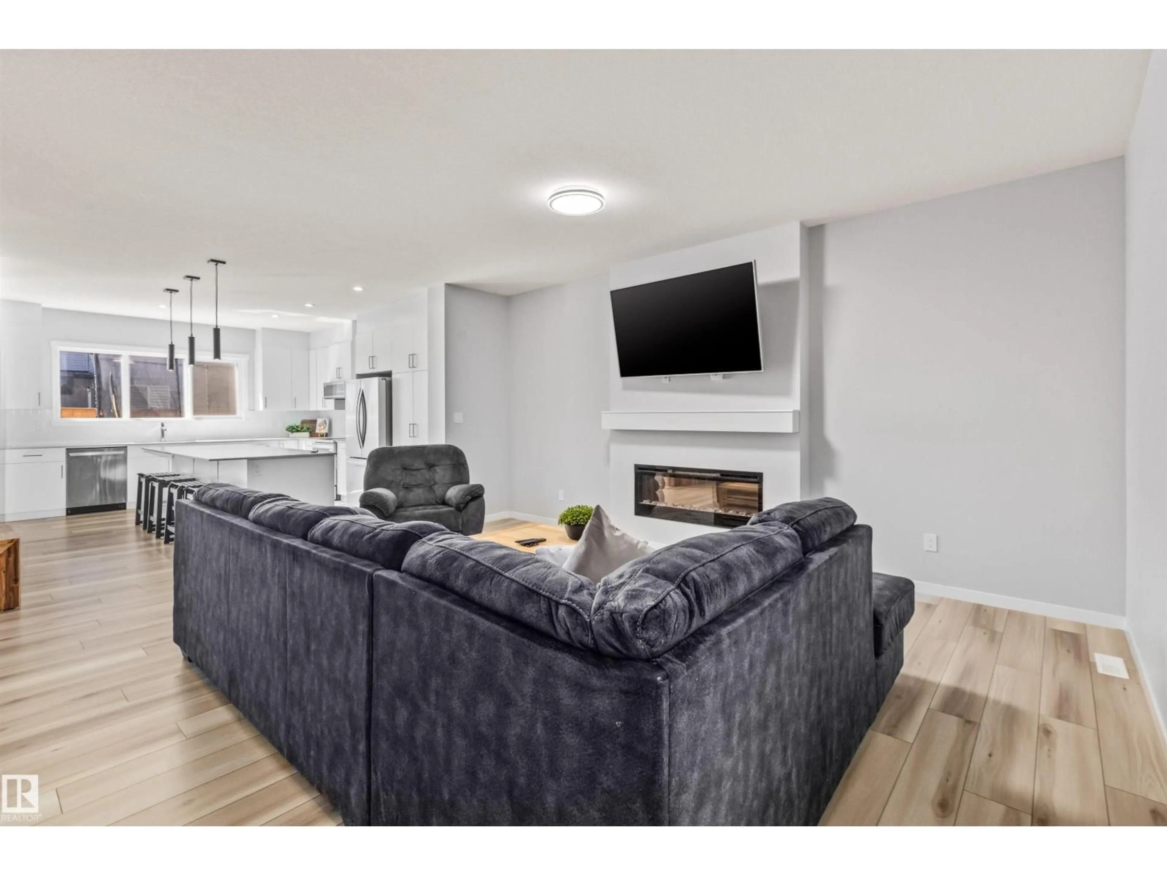 Living room with furniture, unknown for NW - 7113 177A AV, Edmonton Alberta T5Z0T4