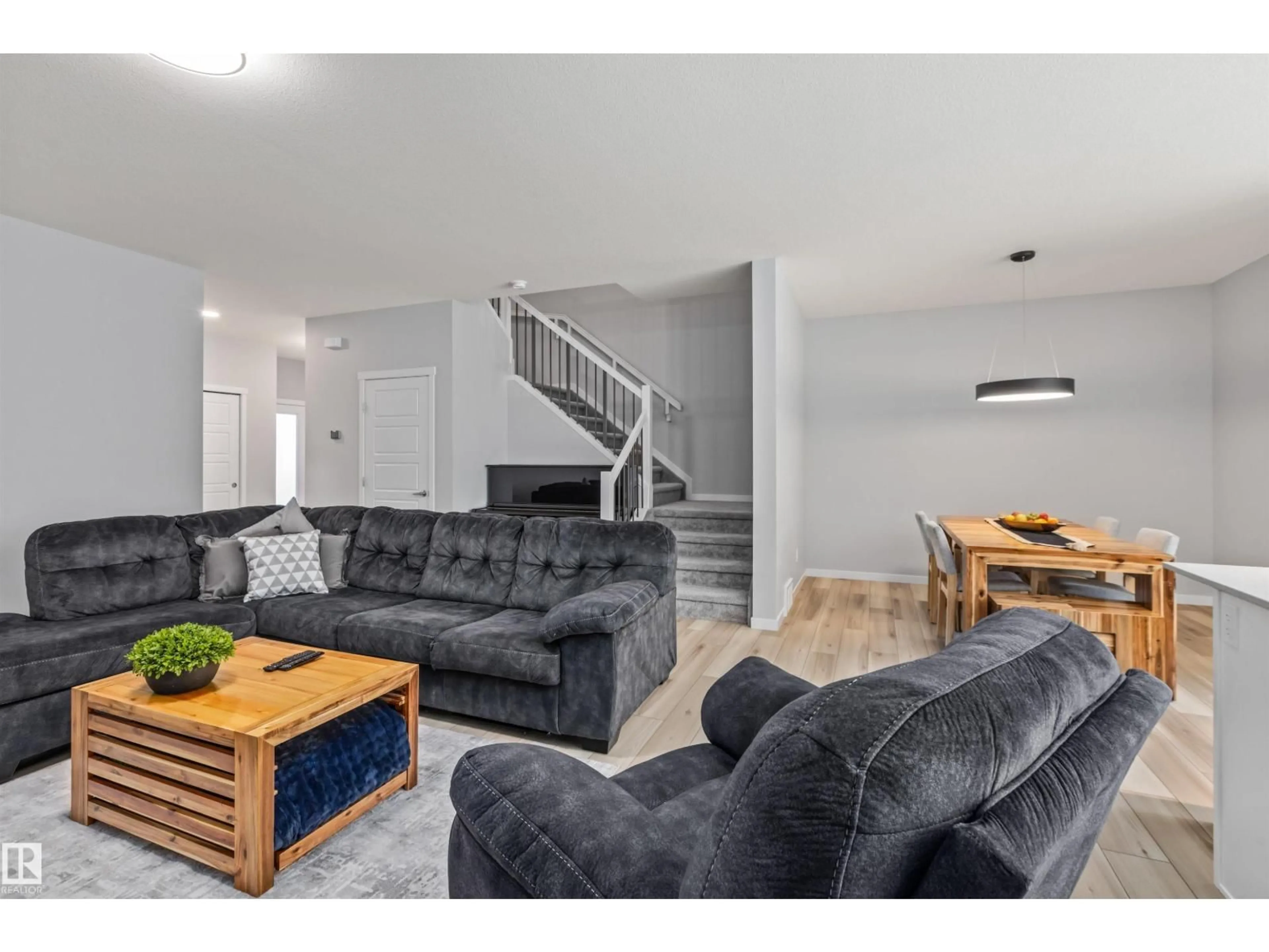 Living room with furniture, unknown for NW - 7113 177A AV, Edmonton Alberta T5Z0T4