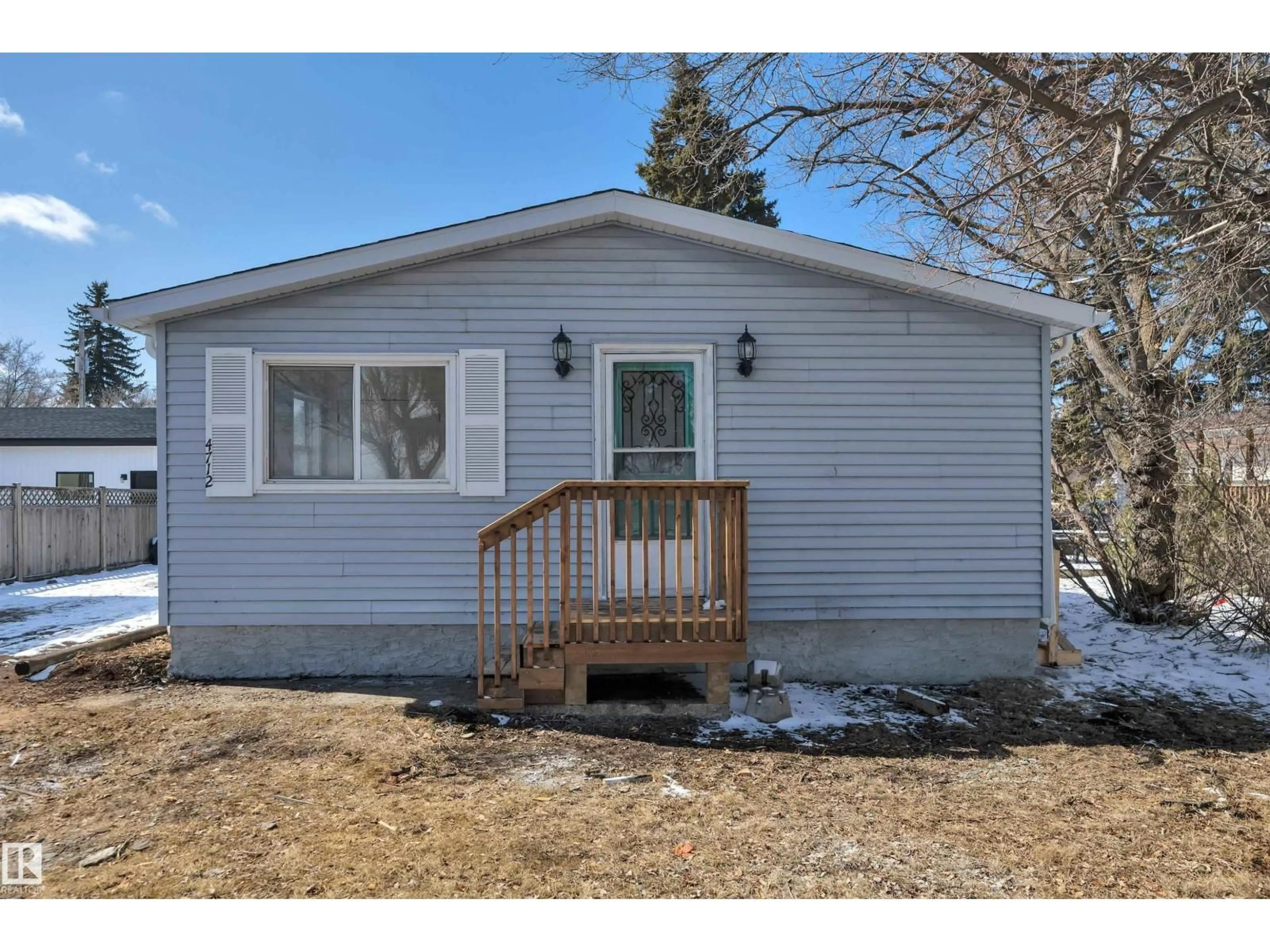 Home with vinyl exterior material, street for 4712 49 ST, Calmar Alberta T0C0V0