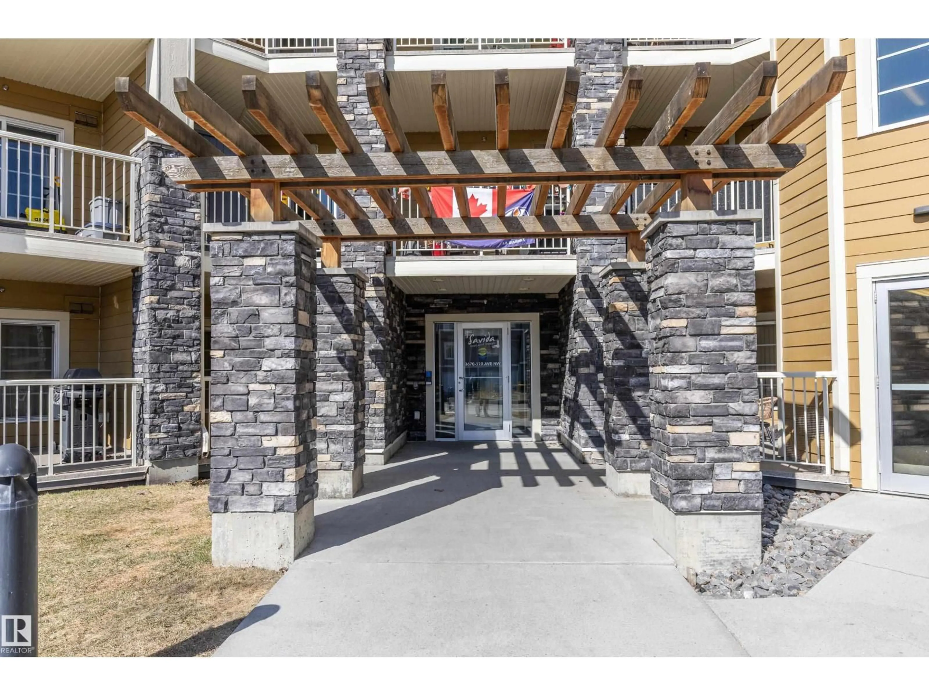Indoor entryway for 107 - 3670 139 AV NW, Edmonton Alberta T5Y3N5