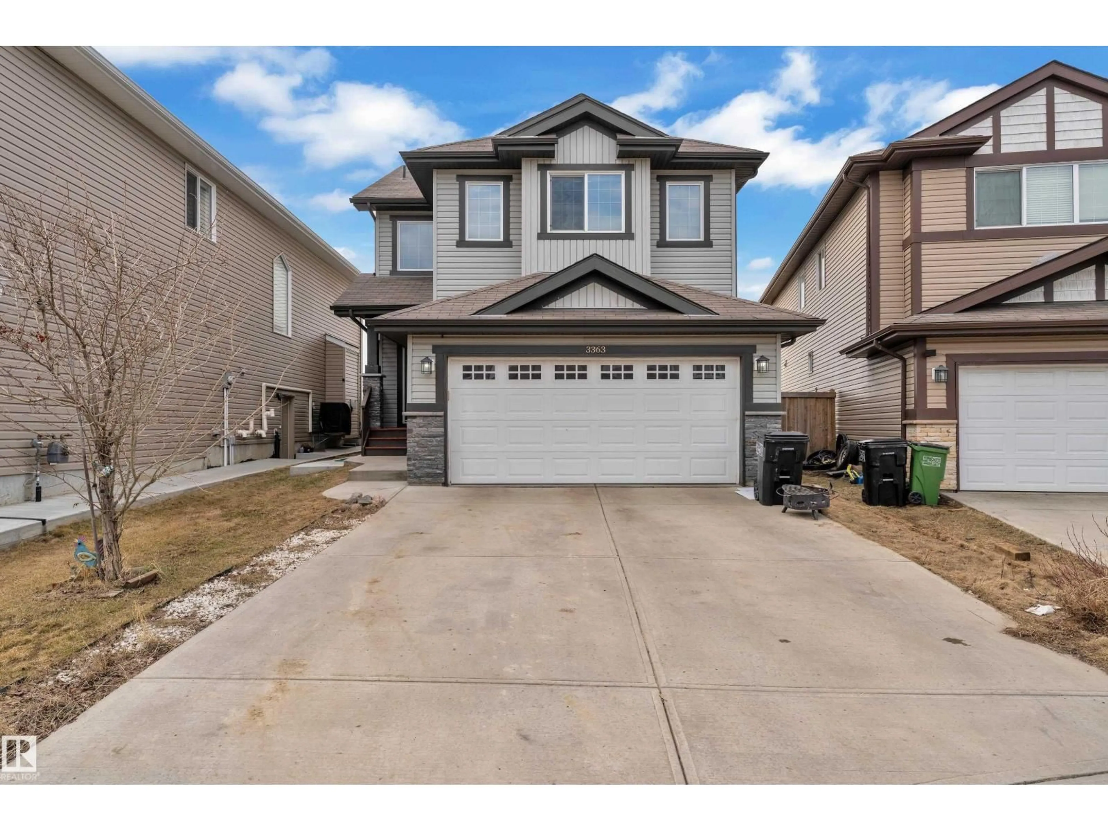Home with vinyl exterior material, street for 3363 13 AV, Edmonton Alberta T6T0Z4