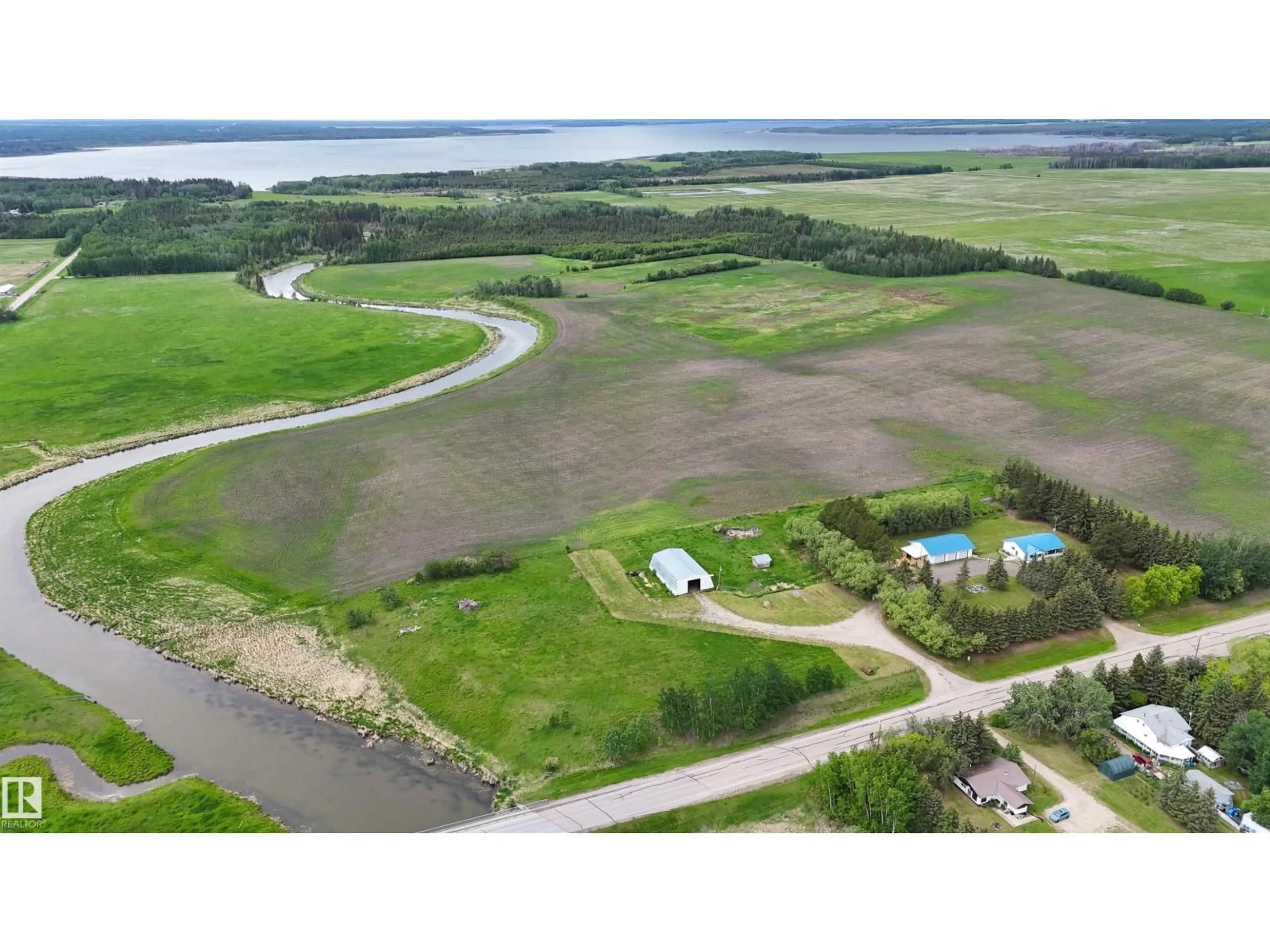 A pic from outside/outdoor area/front of a property/back of a property/a pic from drone, water/lake/river/ocean view for 53508 RANGE ROAD 92, Rural Yellowhead Alberta T0E2M0